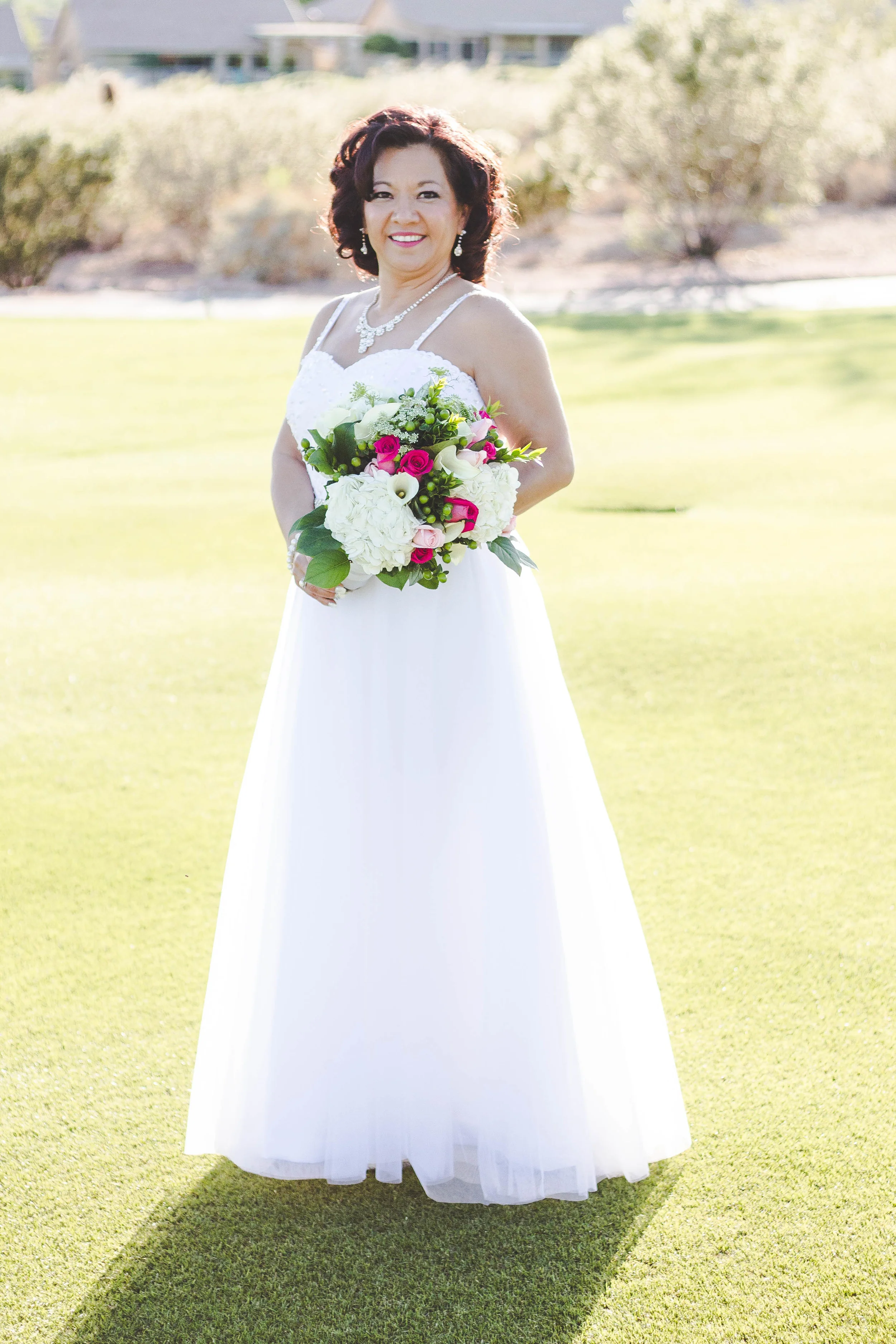 I just love this shot. This dress caught the light so beautifully! The bride looked like she was floating all day...