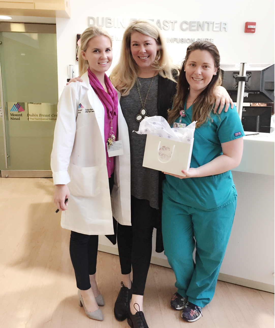 Founder Cynthia Besteman delivering products from her "Beloved Line" to a patient at Mount Sinai Hospital in NYC