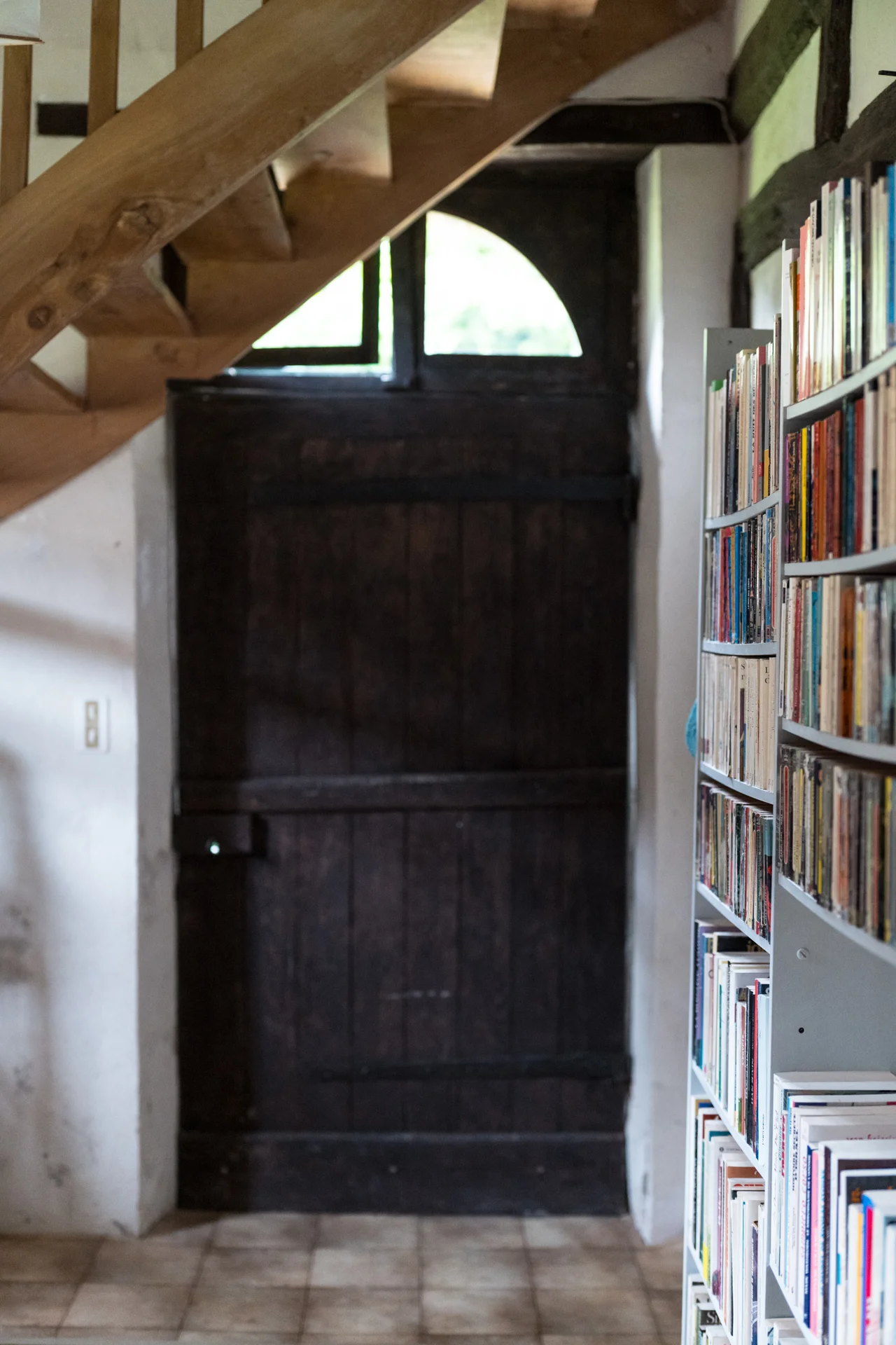 The side door, with just a hint of the staircase. Photo by Flore Addison @the.flo.show