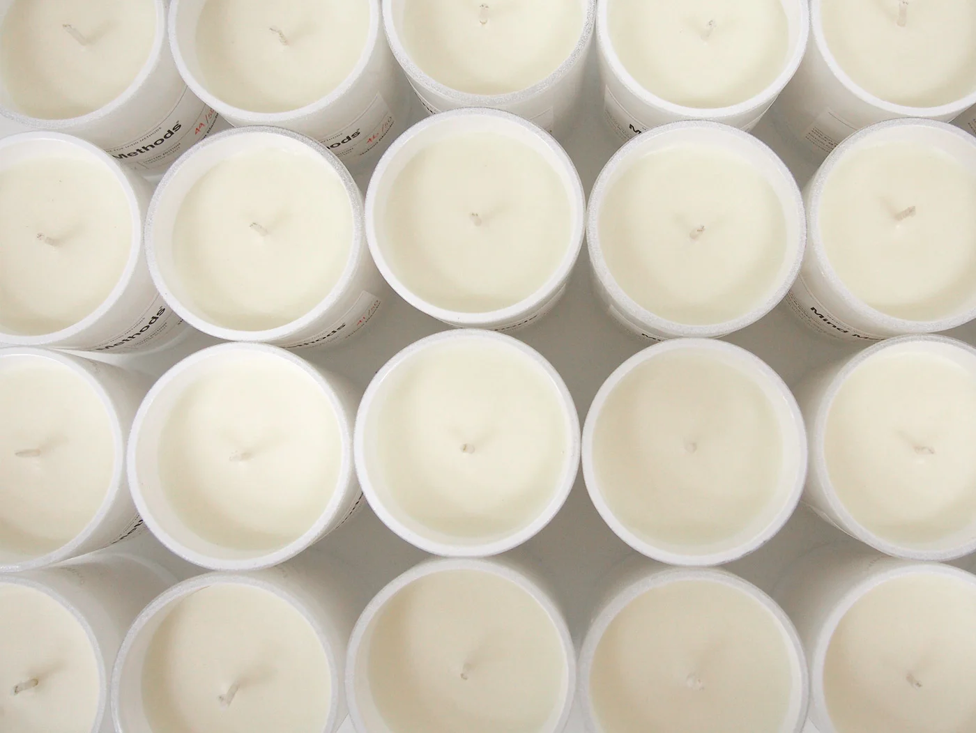 Once the wax has set, the packaging is completed. We are extremely happy with the finish of these soy wax candles.