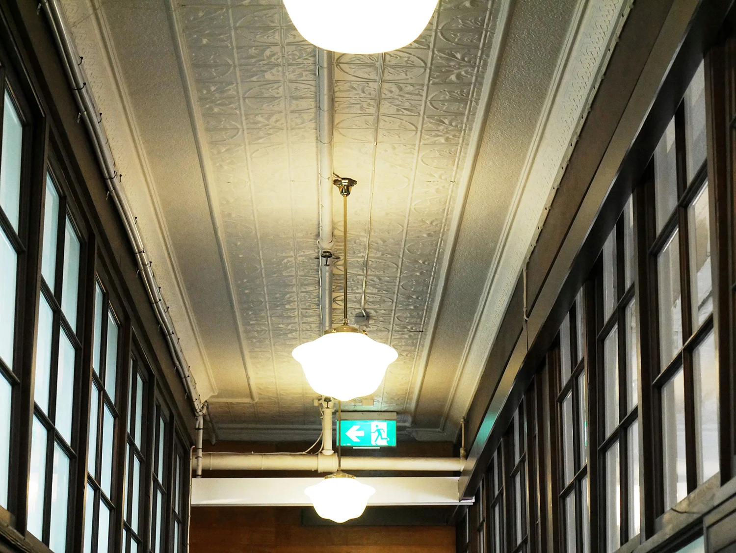 Pressed metal ceilings with original light fittings