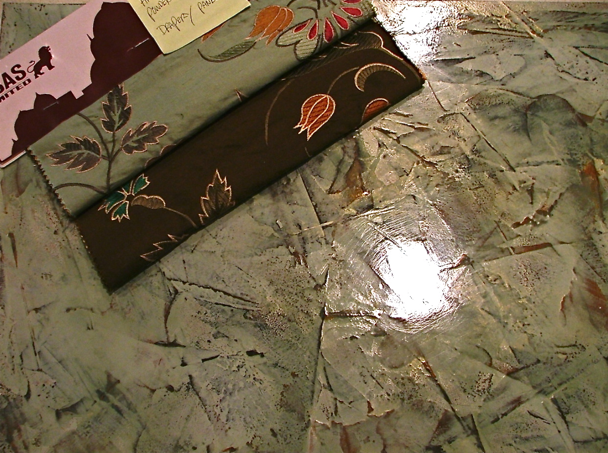 This mixed medium Venetian Plaster finish was develop specifically for the window treatment fabrics, shown here and was used on the ceiling in a dining room and adjacent powder room.