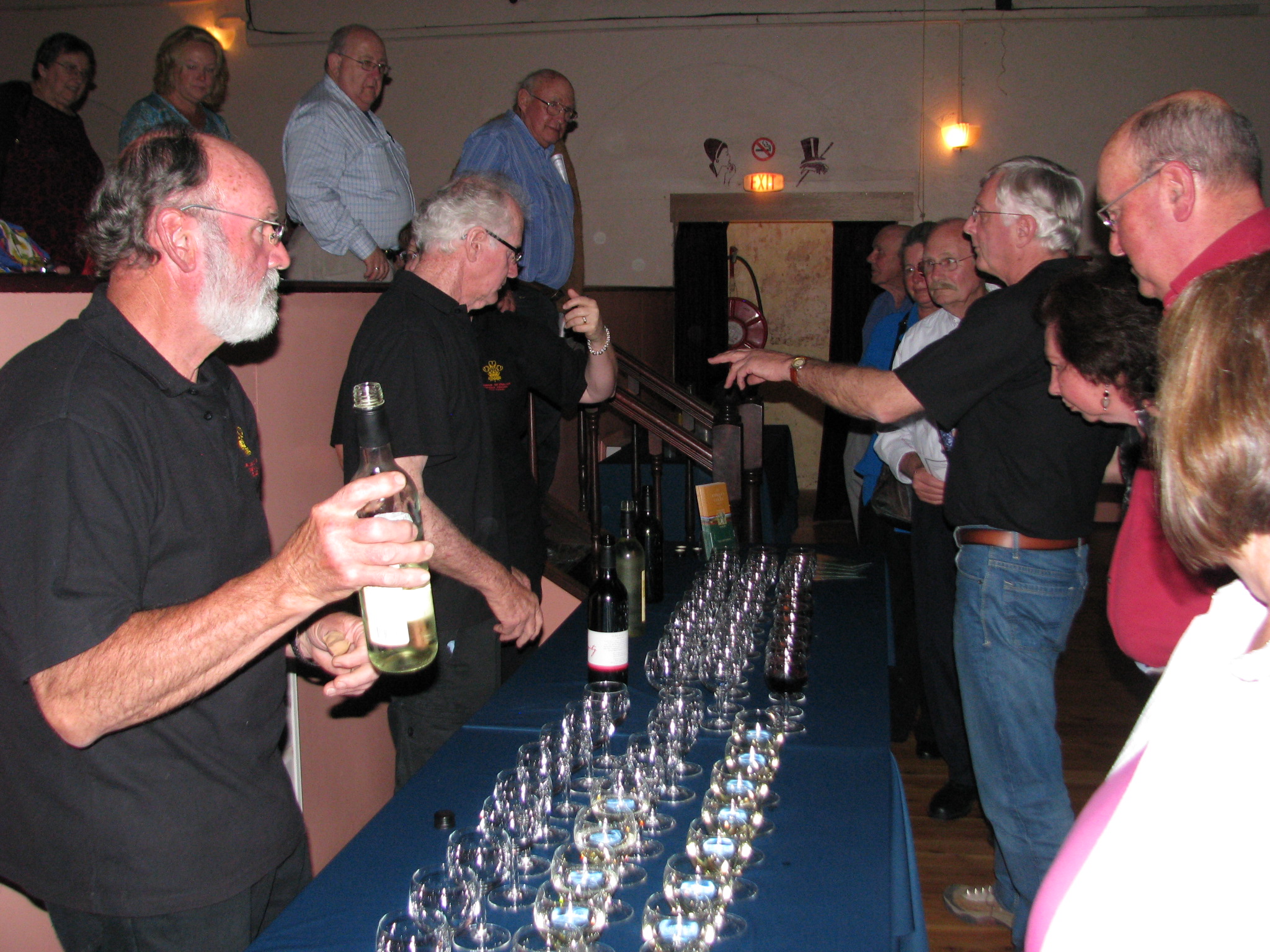 Patrons enjoy the magnificent wine from sponsor Steins Wines.JPG