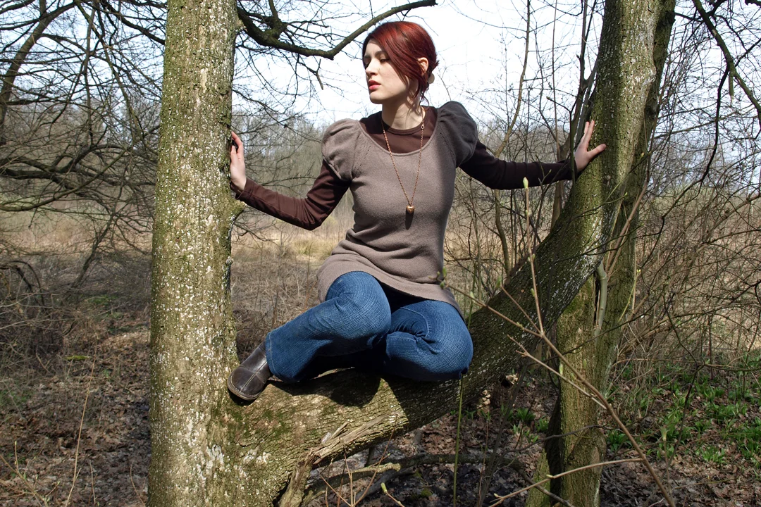 I'm too lazy right now to look for old pictures I took way back when I went on long walks while being depressed so here's a random photo of me sitting on a tree from 2009.