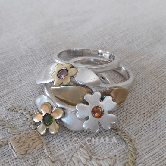 3 rings with flowers and leaves.small.jpg