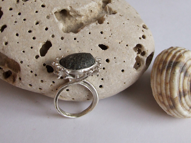 60 Seaweed man holding pebble ring.jpg