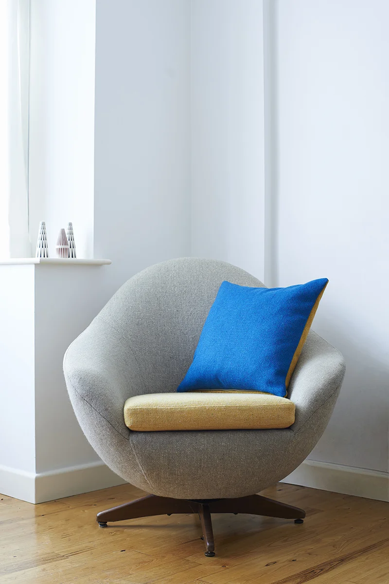 Ionian Sea Blue & Mustard Yellow Twin Tone Cushion on Joff's own vintage Egg Chair (a £15 Ebay bargain!) which was upholstered with Bute Fabrics' material 10 years ao. It still looks as new as the day he transformed it due to the materials' durability. 
