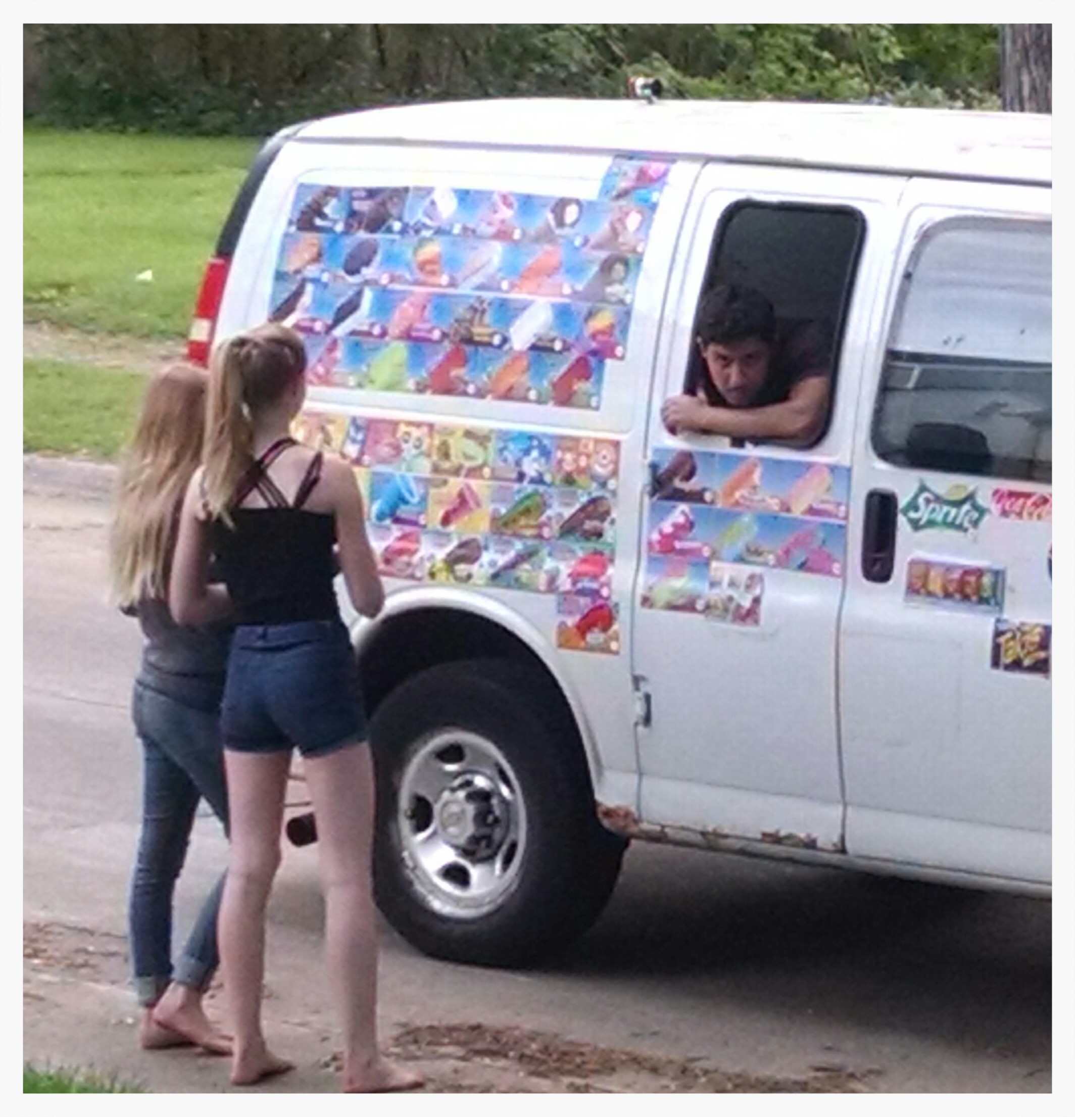 Oh, that ice cream truck and its Christmas music! Ricka and Dicka buying a treat in 2015. ("The corner stores", December 11, 2014.)