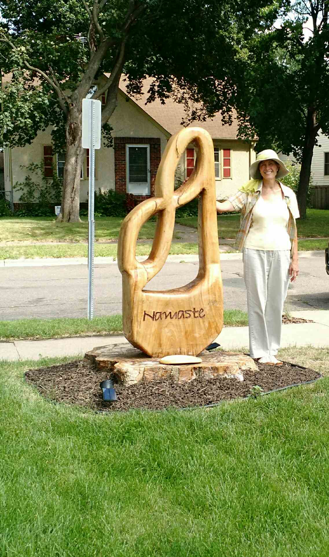 Monica with Efay's sculpture