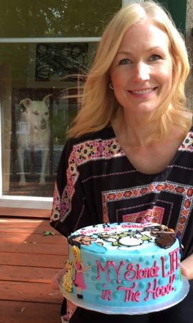 Here I am with the cake (and Lala, photobombing.)