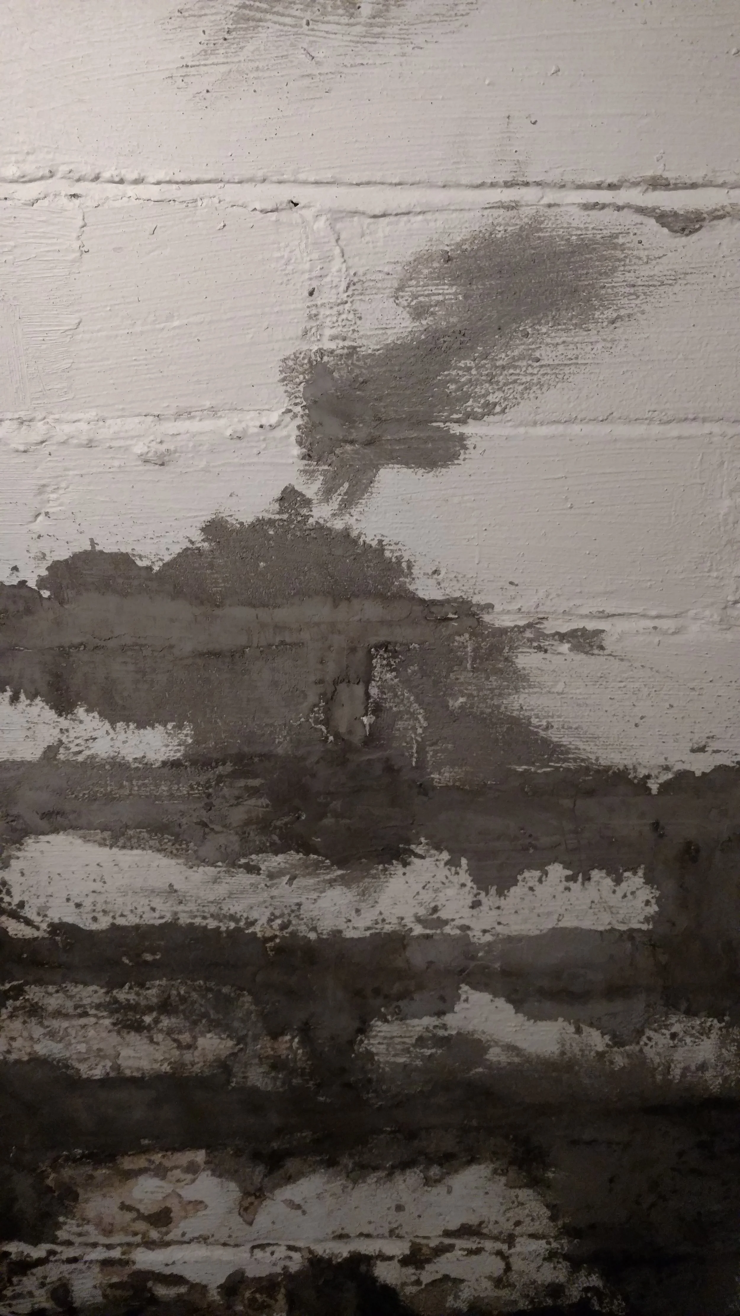 The patching of the wall.