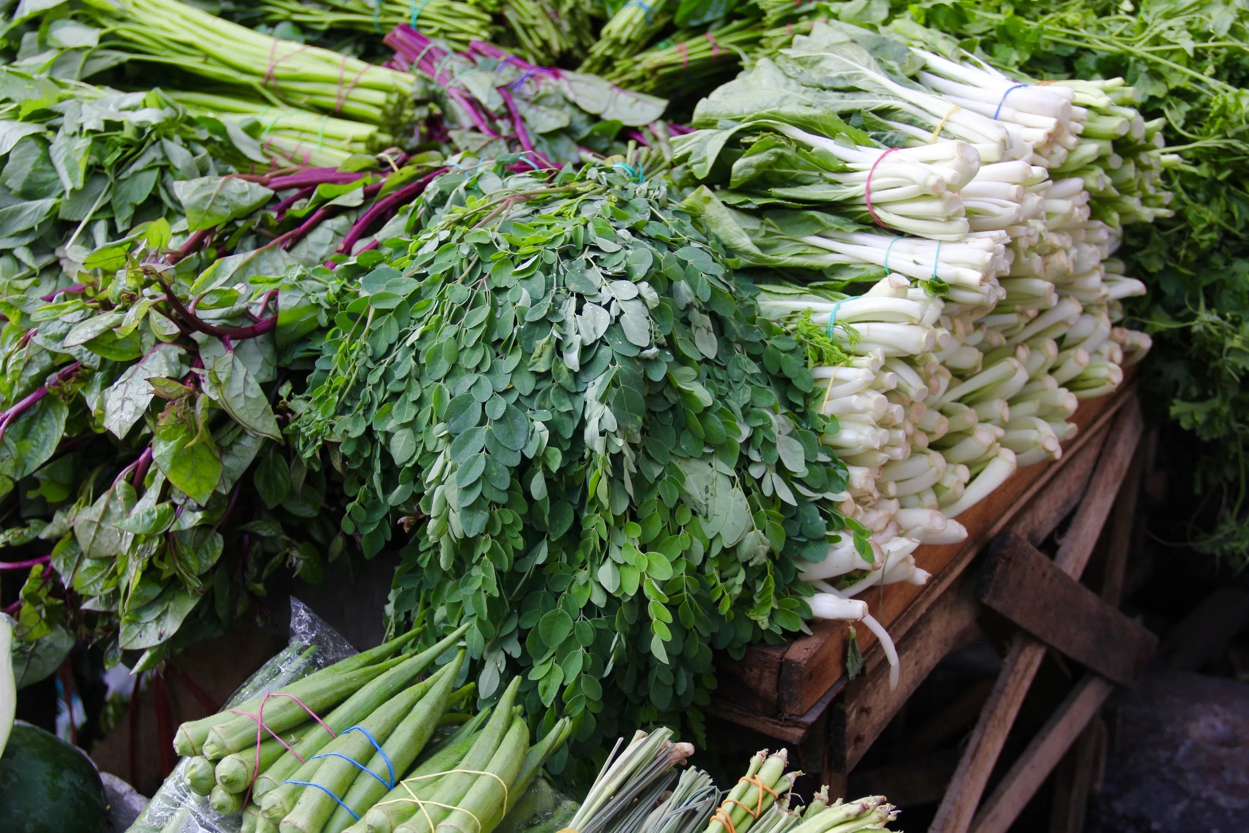 Piles of fresh gulay brought into the city to sell from provincial farms.