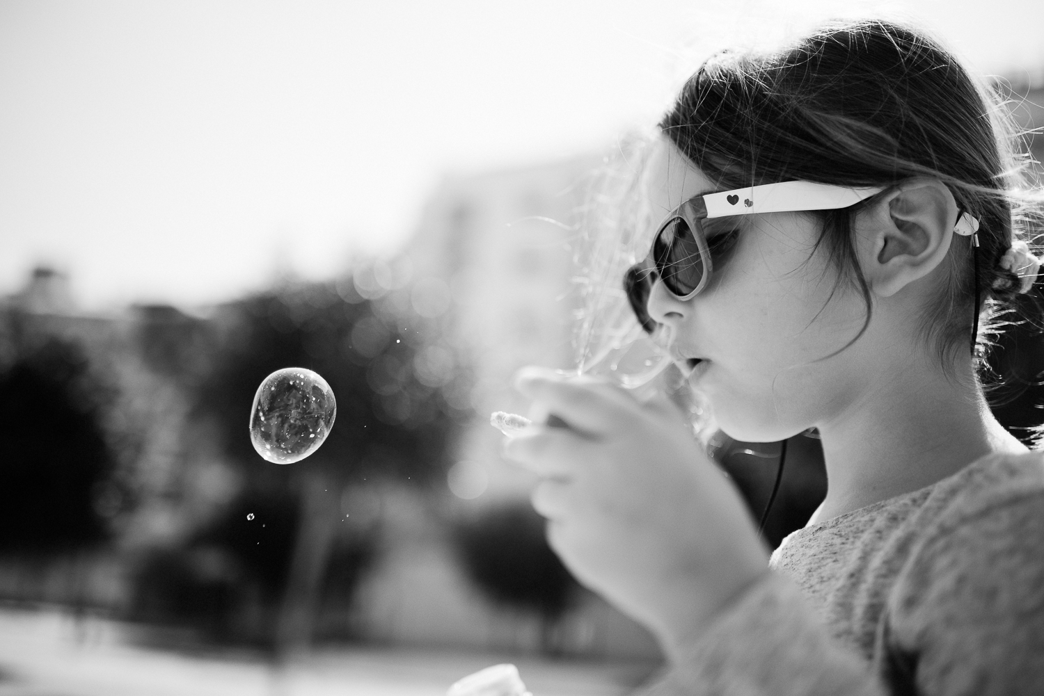 2. Sofía loves playing with bubbles and it's become kind of a challenge to come up with different photographs after some time. I find this b&w very special.