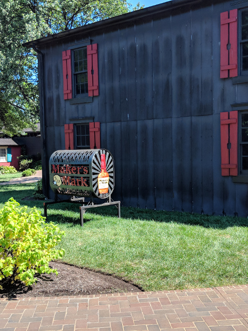 Note that the shutters have bottle shapes in them.