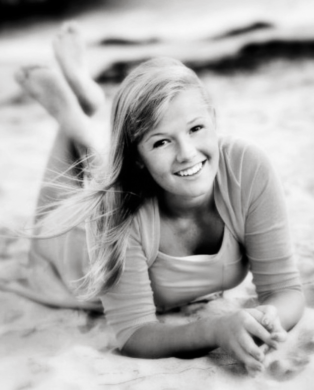 Back when I was a senior in high school, senior pictures were a big deal! I remember loving my picture the most because I was lucky enough to get to have them in the beach (being from Missouri I was a little different then everyone else's) and was very excited to show my friends how well they turned out. I loved this picture in particular because of the how the wind was blowing my hair in a good (but not too wild) way. Haha I sound dumb right? Anyways it was an impressive shot that you had to take on the ground considering you were very pregnant at the time! Haha! Thanks for the great pictures all those years ago!