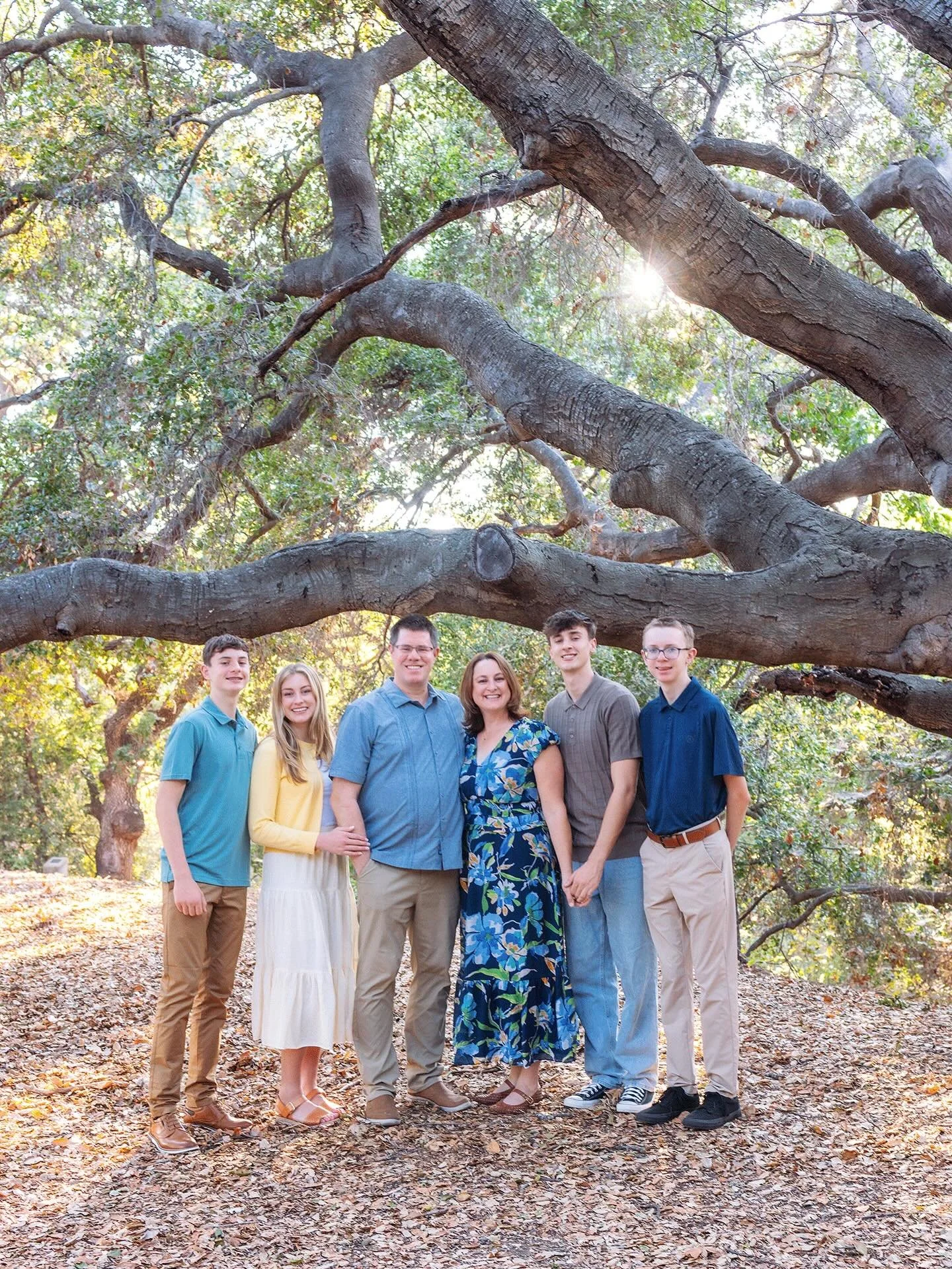As the sun filtered through the old oak tree, wrapping everything in that creamy golden light, I was reminded how special it is to watch a family grow from when the kids were itty bitty. Moments like this don&rsquo;t just become images&mdash;they bec