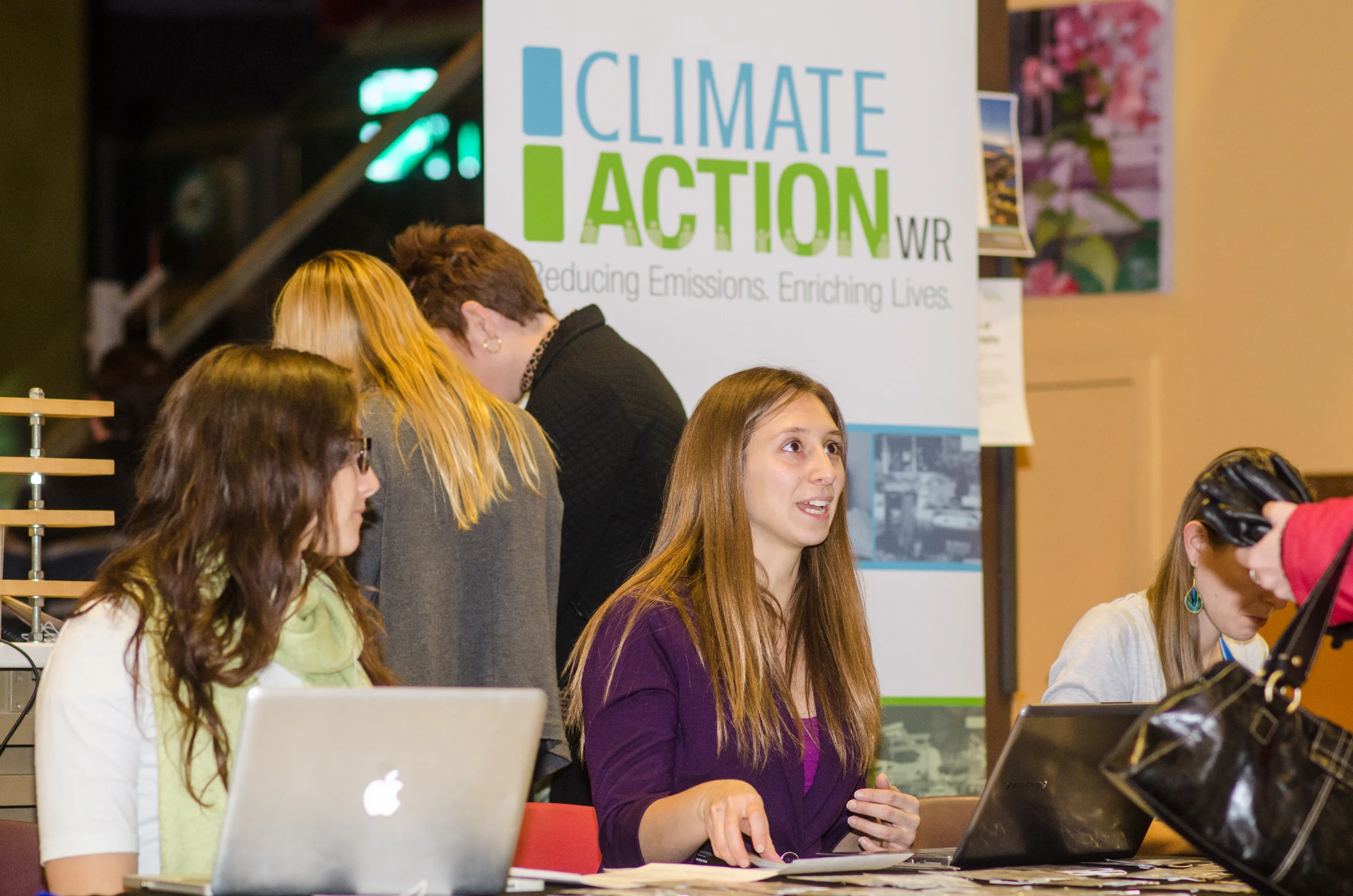 Nina Blagojevic and Lisa Chapman handle registrants for ClimateActionWR's 1st Anniversary.