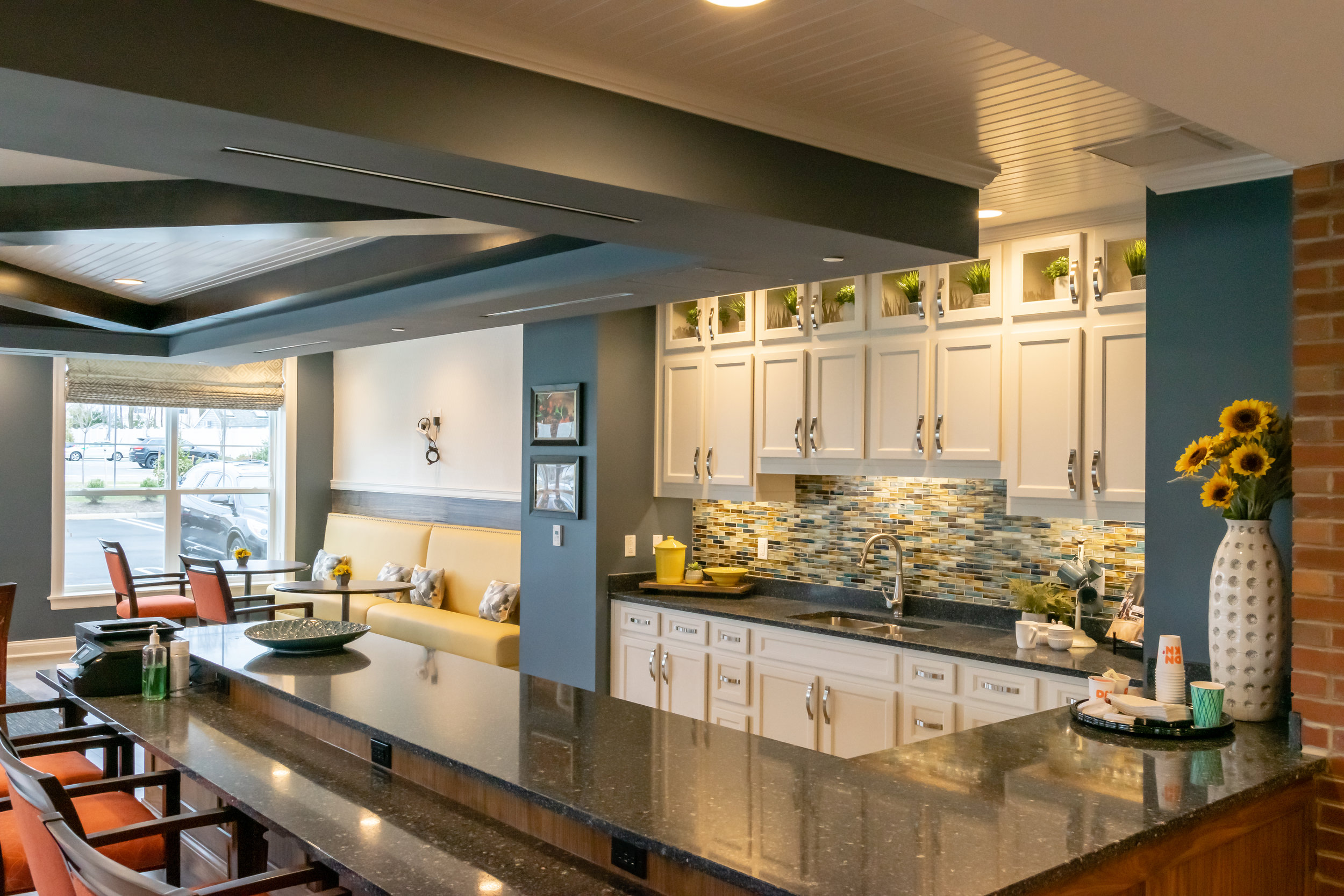 Interior Kitchen Bar The Chelsea Senior Living Facility Built by March Associates Construction. We build luxury residential buildings.
