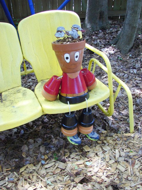 Garden 3 Chair with pot person.jpeg