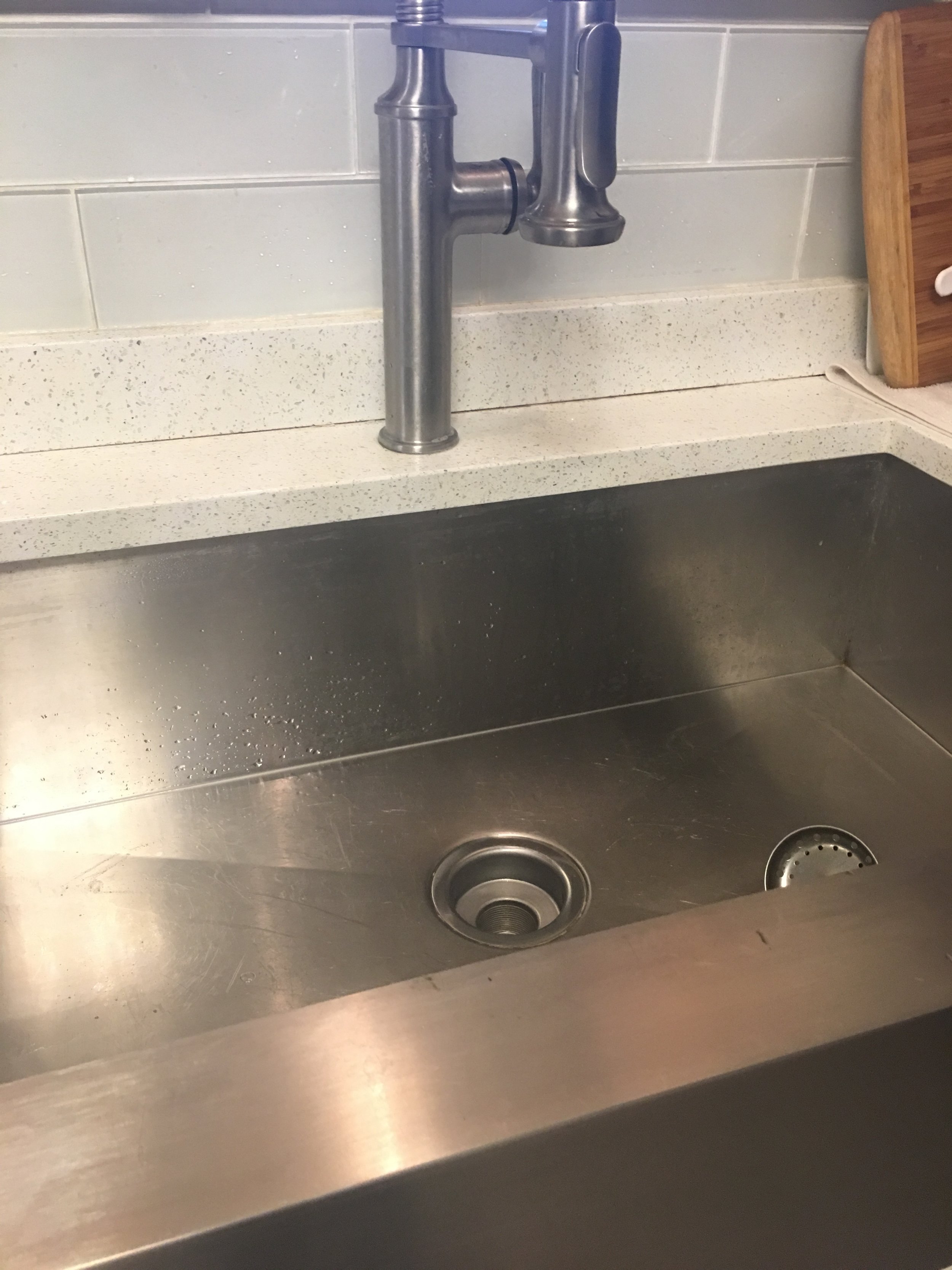 How To Clean A Kitchen Sink, From Faucet To Drain!