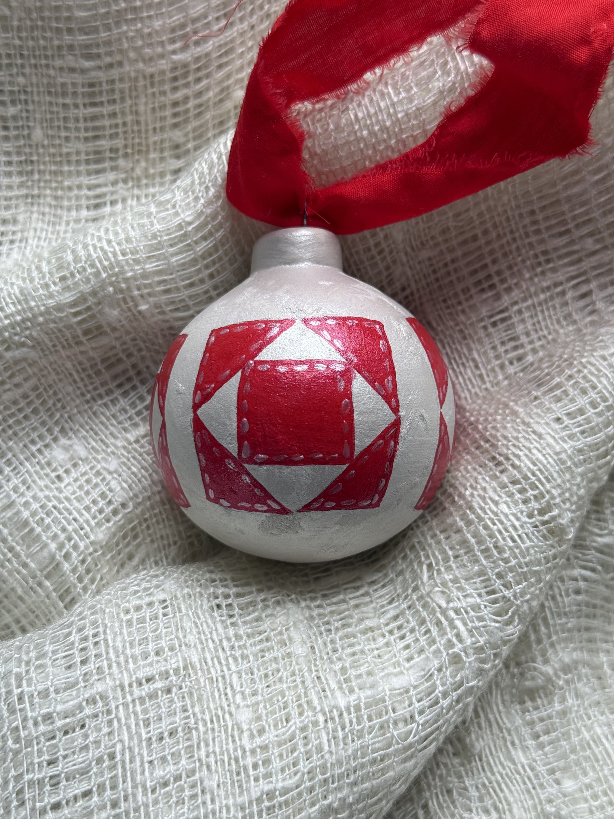 Ceramic Ball Ornament Hand Painted with a Quilt Pattern