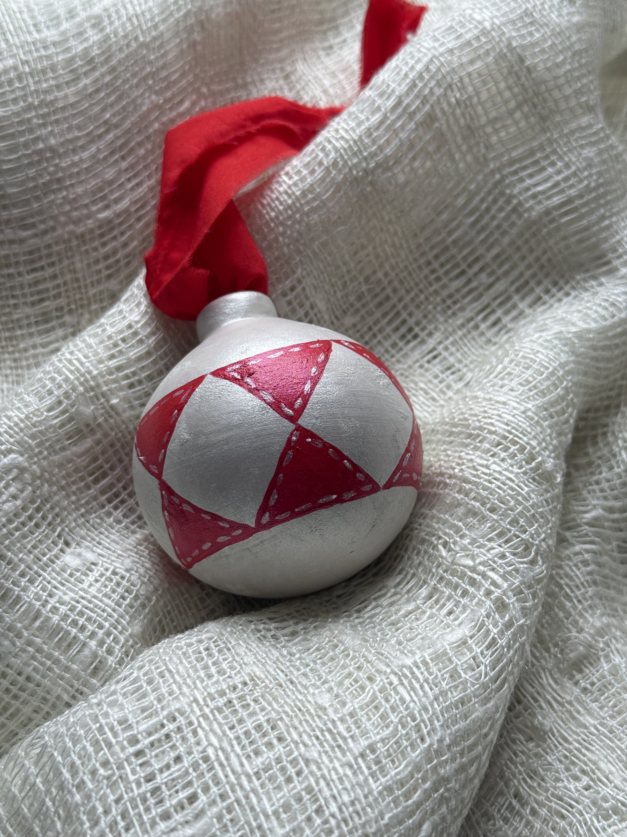 Ceramic Ball Ornament Hand Painted with a Quilt Pattern