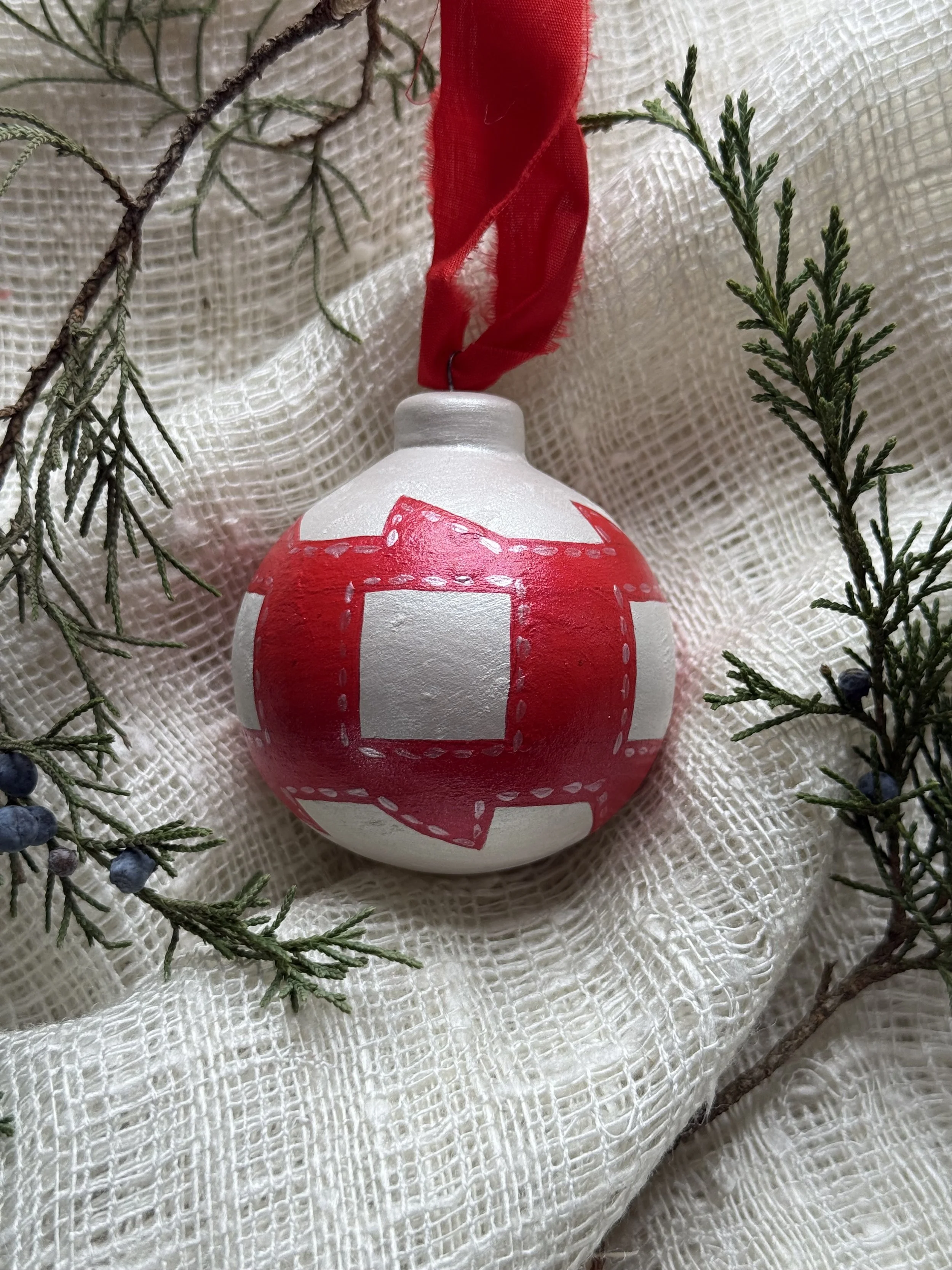 Ceramic Ball Ornament Hand Painted with a Quilt Pattern