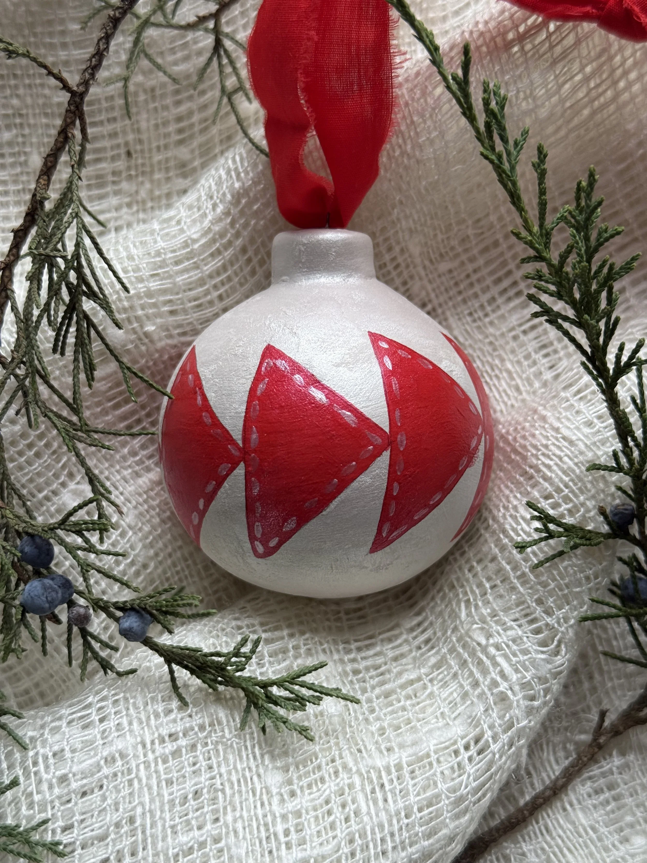 Ceramic Ball Ornament Hand Painted with a Quilt Pattern