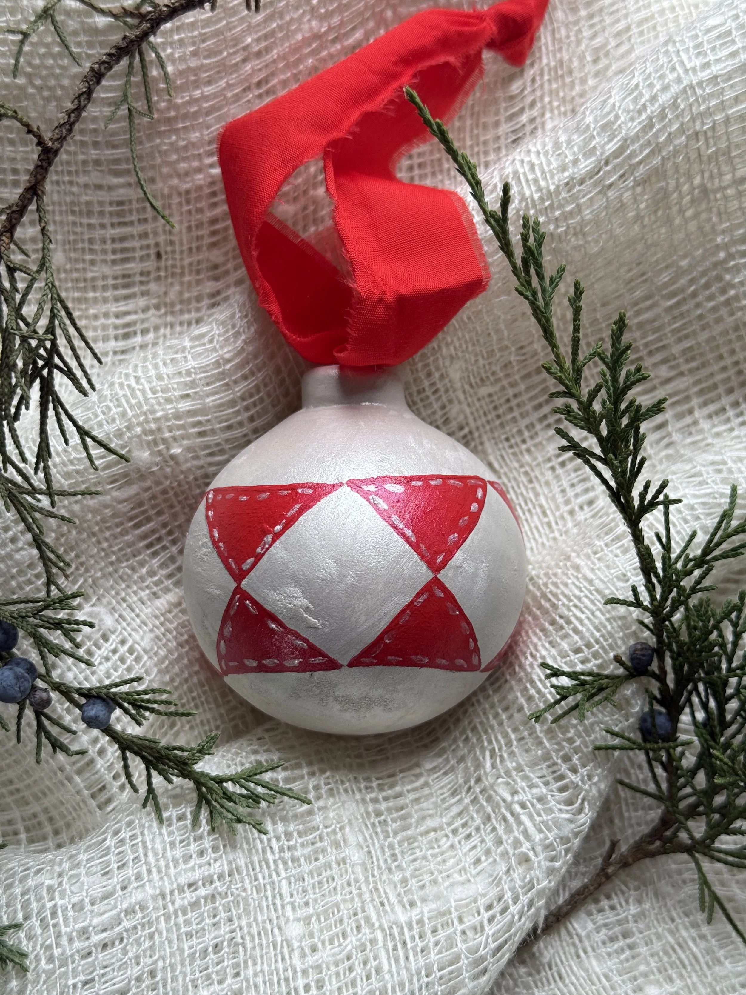 Ceramic Ball Ornament Hand Painted with a Quilt Pattern