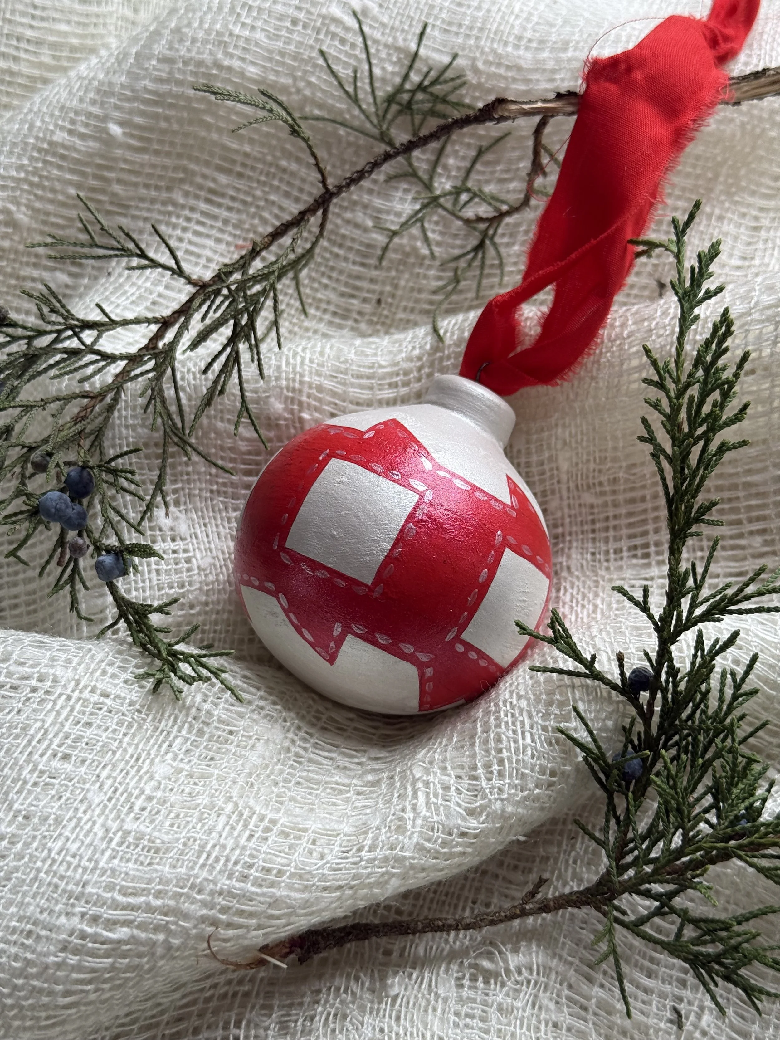 Ceramic Ball Ornament Hand Painted with a Quilt Pattern