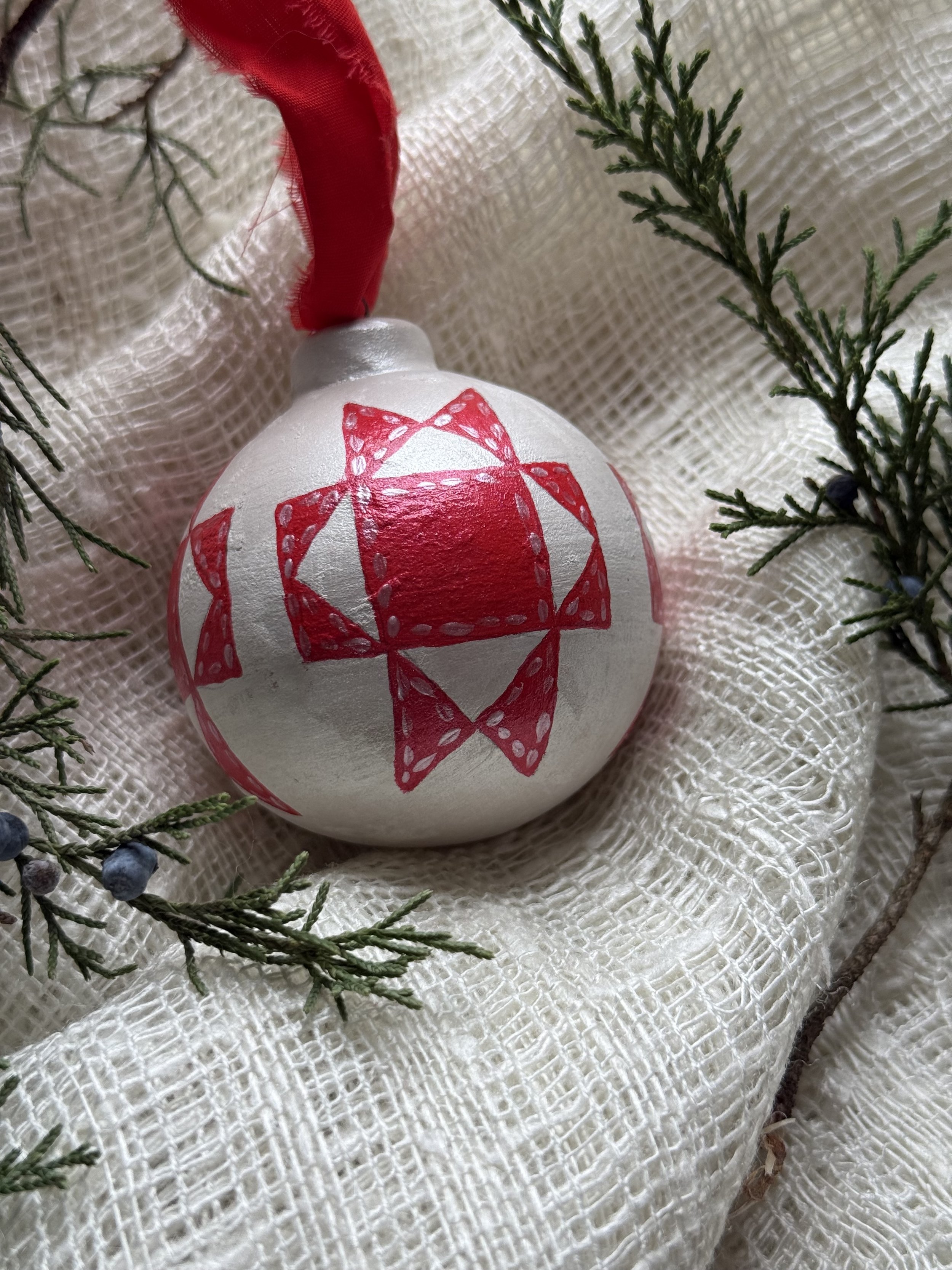 Ceramic Ball Ornament Hand Painted with a Quilt Pattern