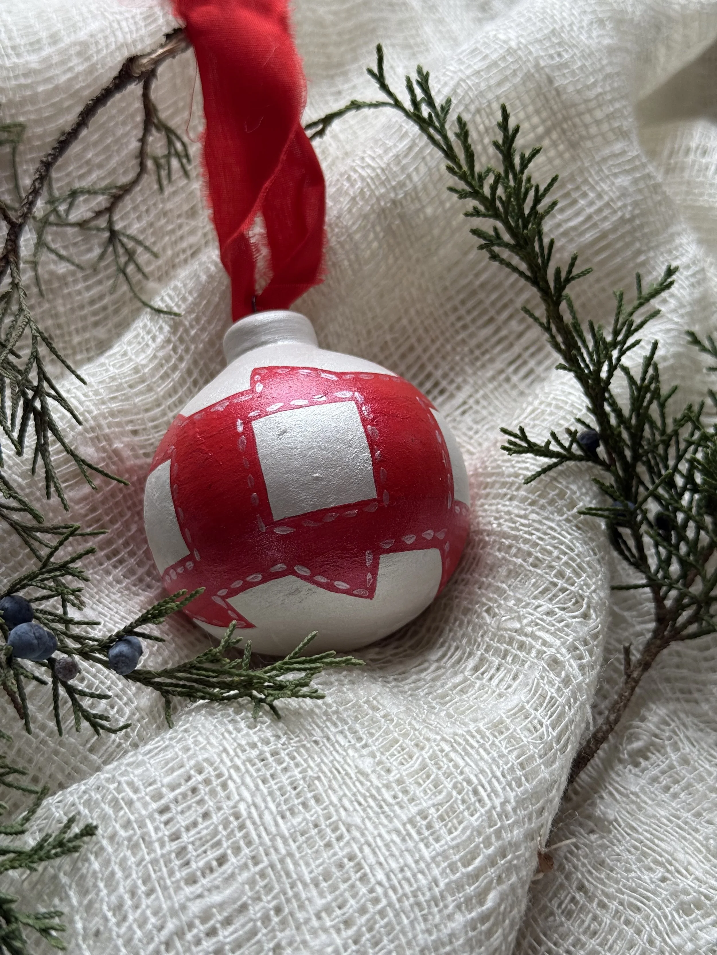 Ceramic Ball Ornament Hand Painted with a Quilt Pattern