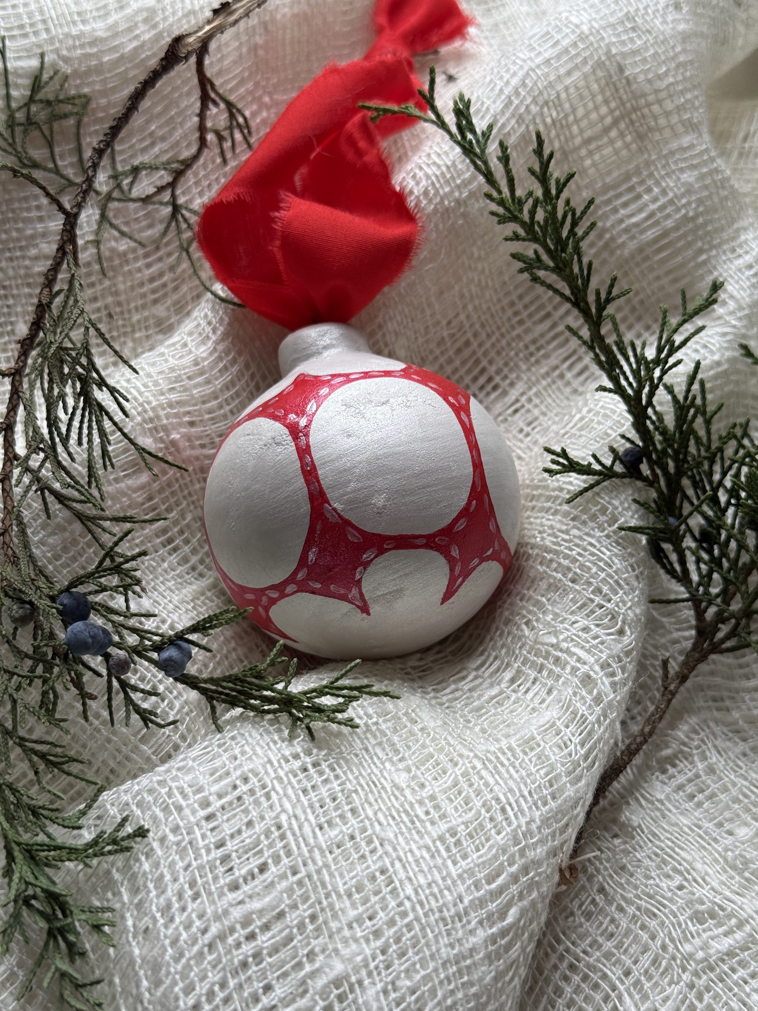 Ceramic Ball Ornament Hand Painted with a Quilt Pattern