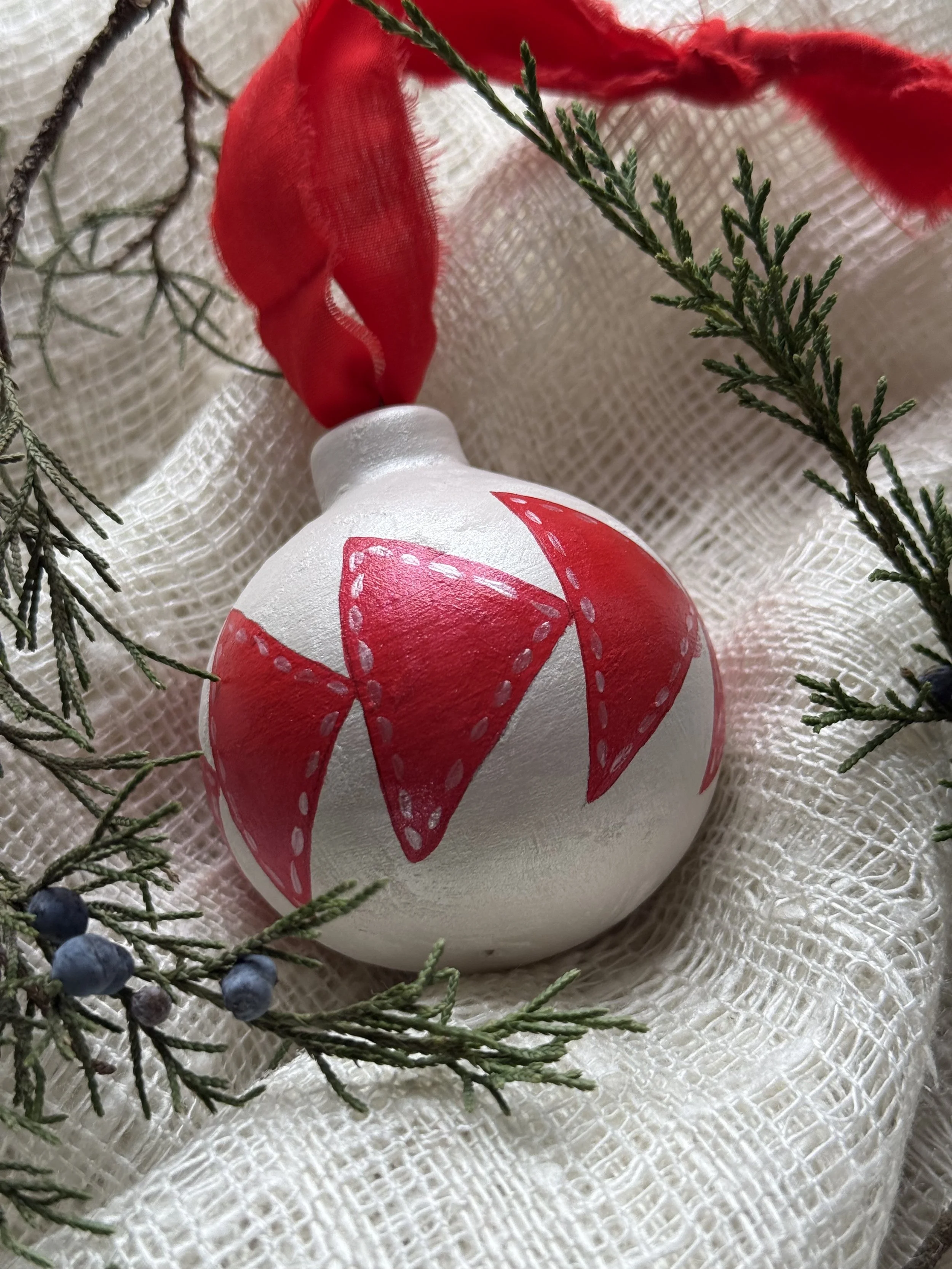 Ceramic Ball Ornament Hand Painted with a Quilt Pattern