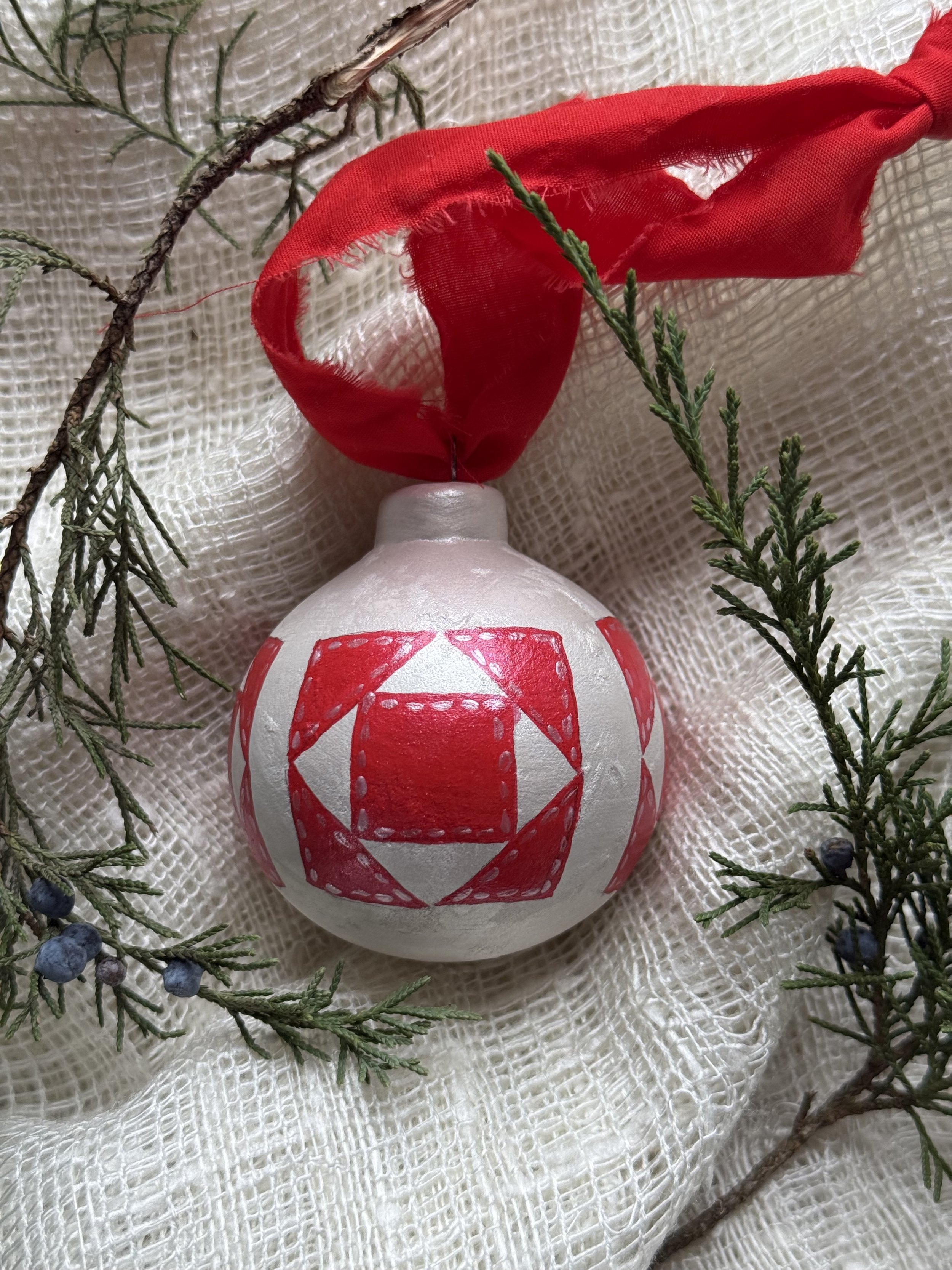 Ceramic Ball Ornament Hand Painted with a Quilt Pattern