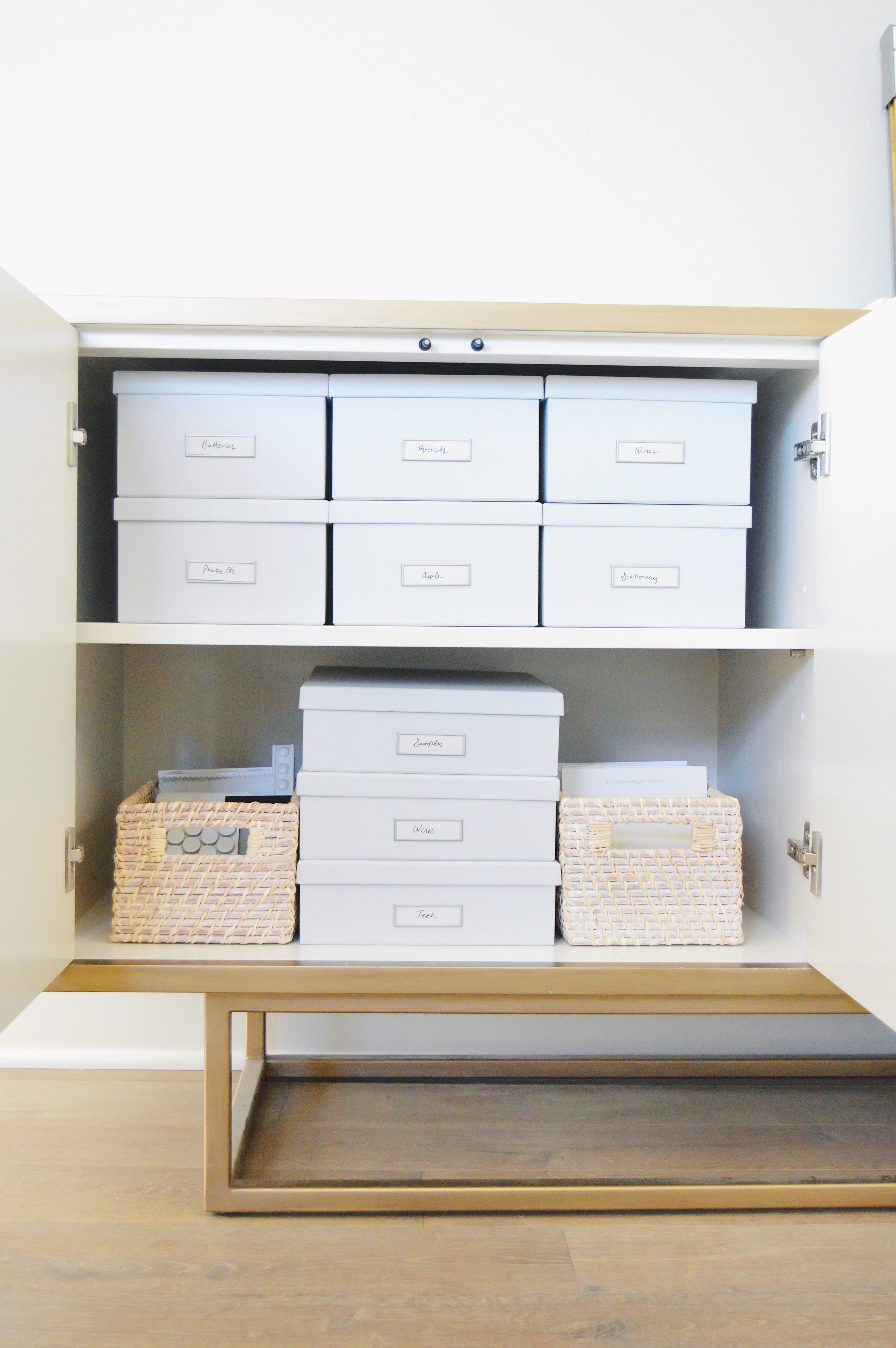  In our Living Room, I used lidded grey boxes to store things like batteries, apple accessories, tech stuff - you name it! I used handled rattan bins to store the samples I’ve been collecting since beginning our renovation.  