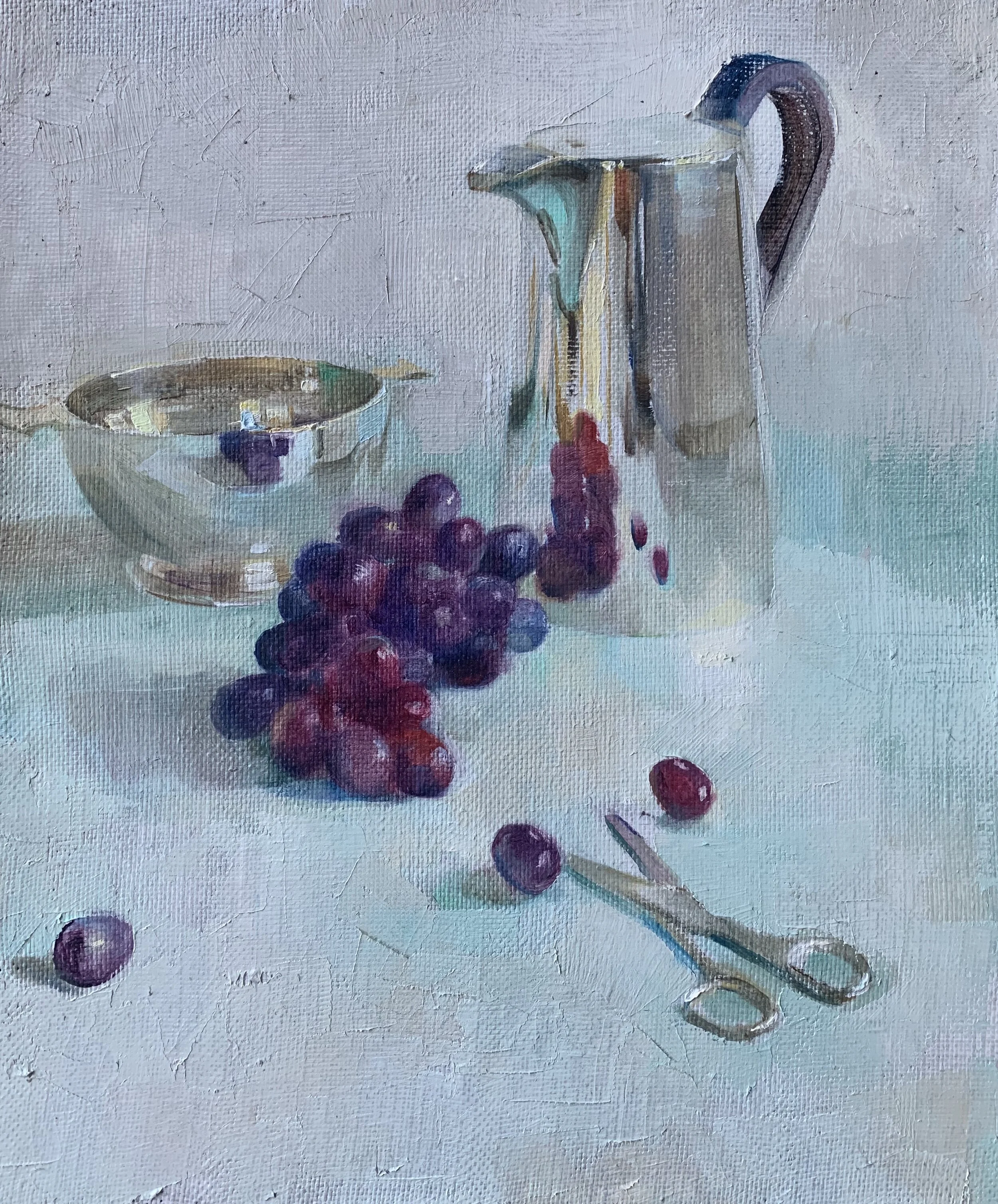 Grapes reflected in Silver.