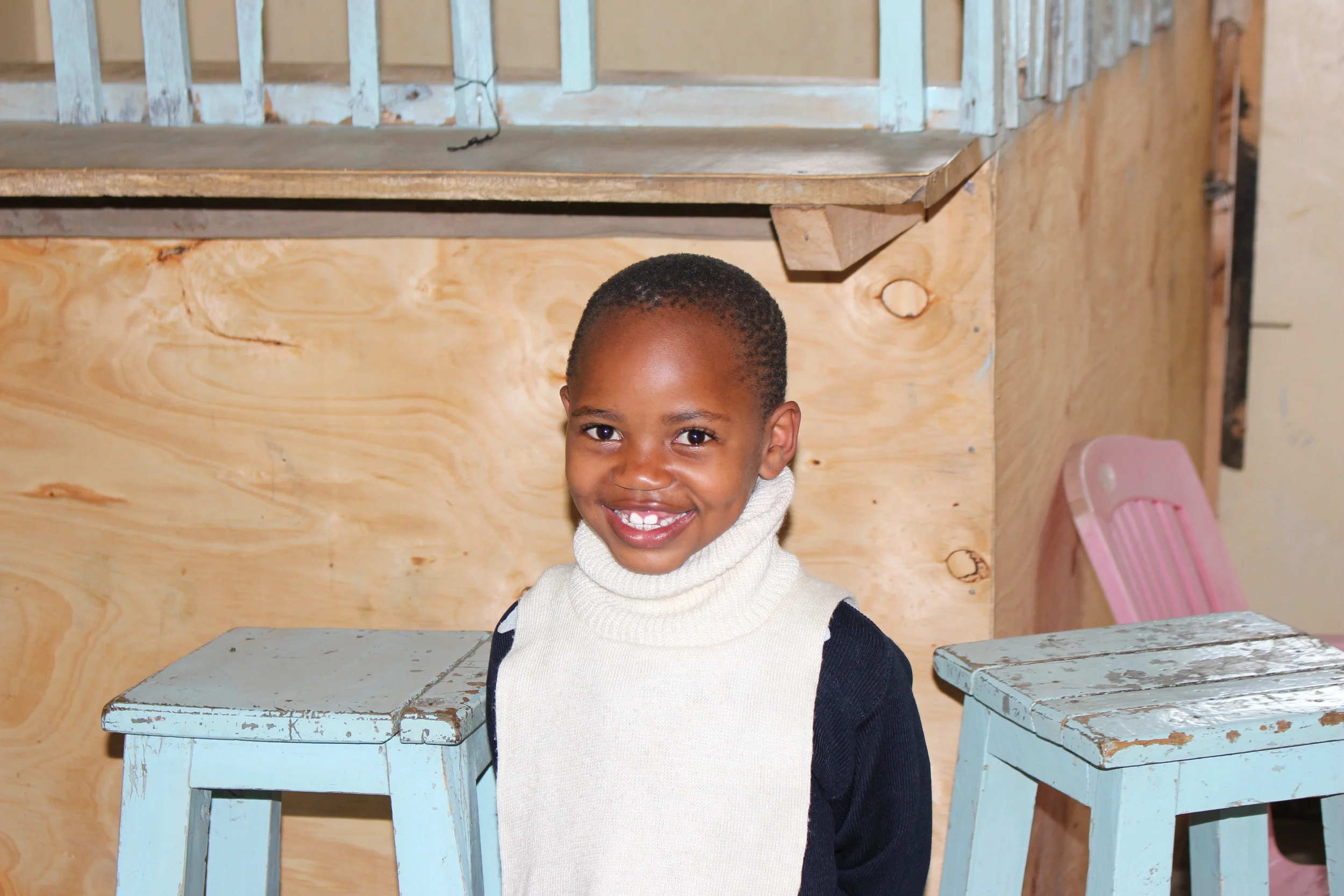 This is Nadia giving us a big smile in her grandmother's new place