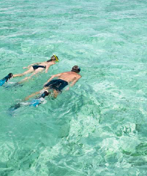 Ambergris Cay Brochure, Turks & Caicos Sporting Club