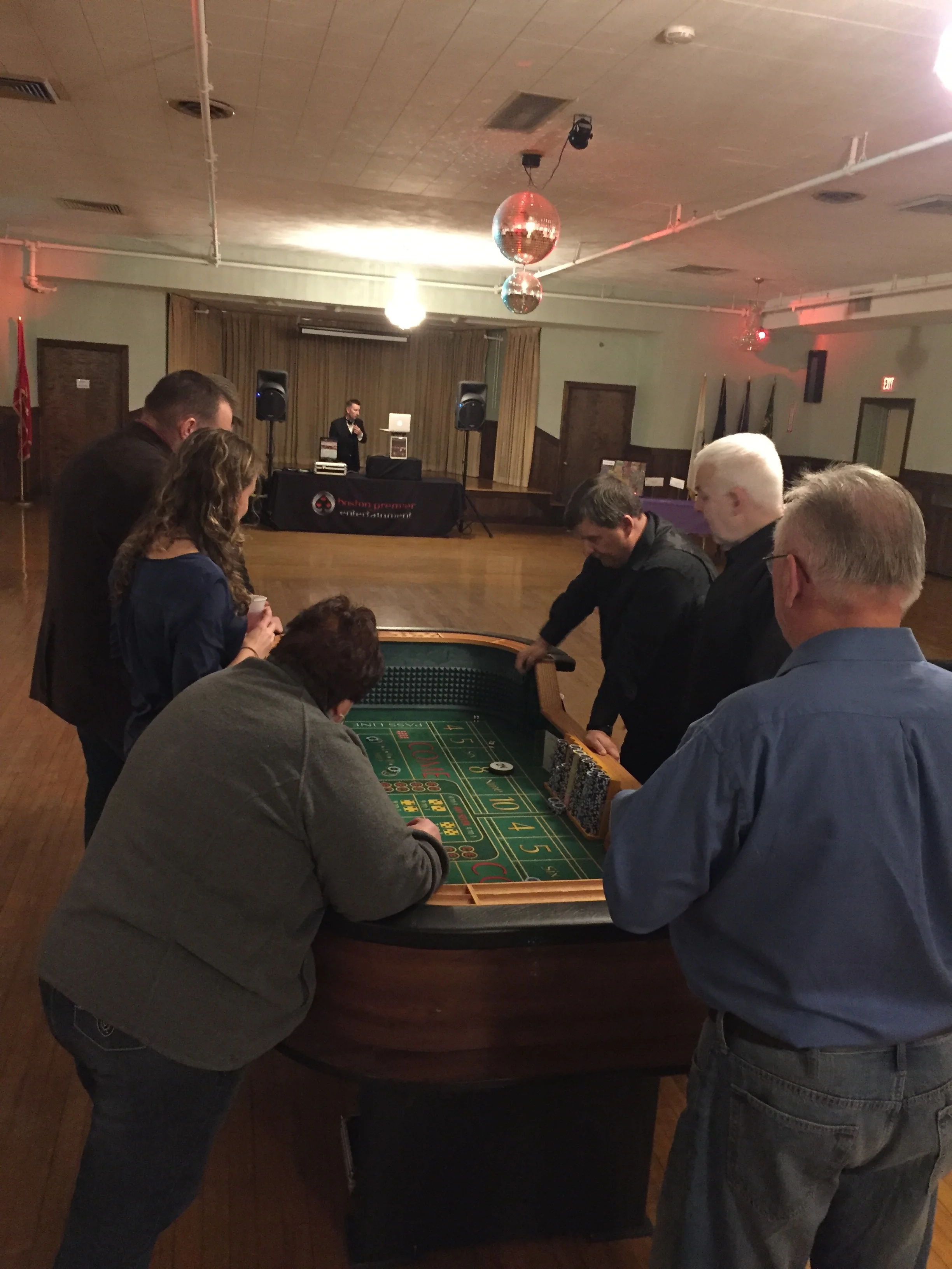 Guests enjoying the tables at Casino Night 2015.