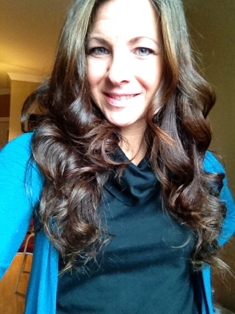 Hair done the next morning post-wash. (When I can, I wash my hair at night and sleep on it to reduce frizz). No products. Just flat-iron curl. 