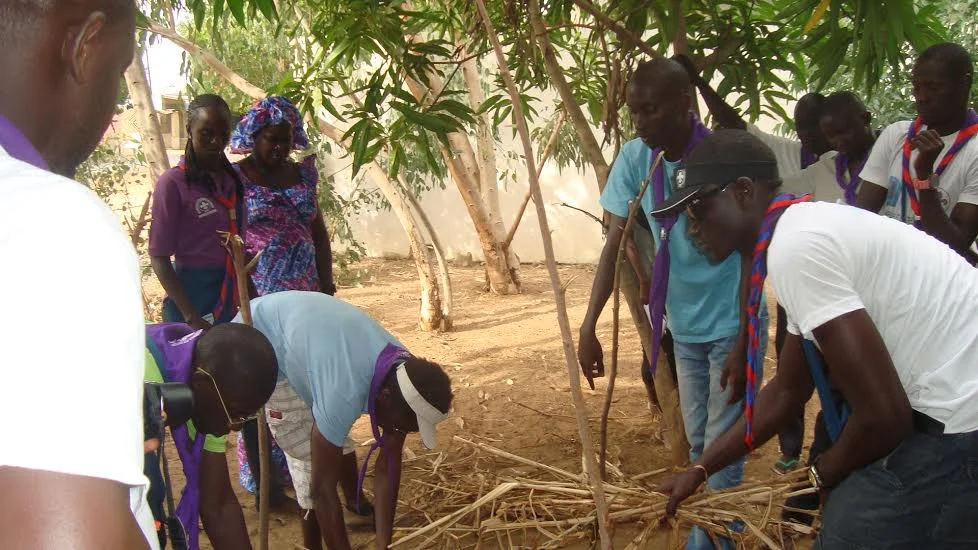 Scouts building compost, Fimela. Fall 2014