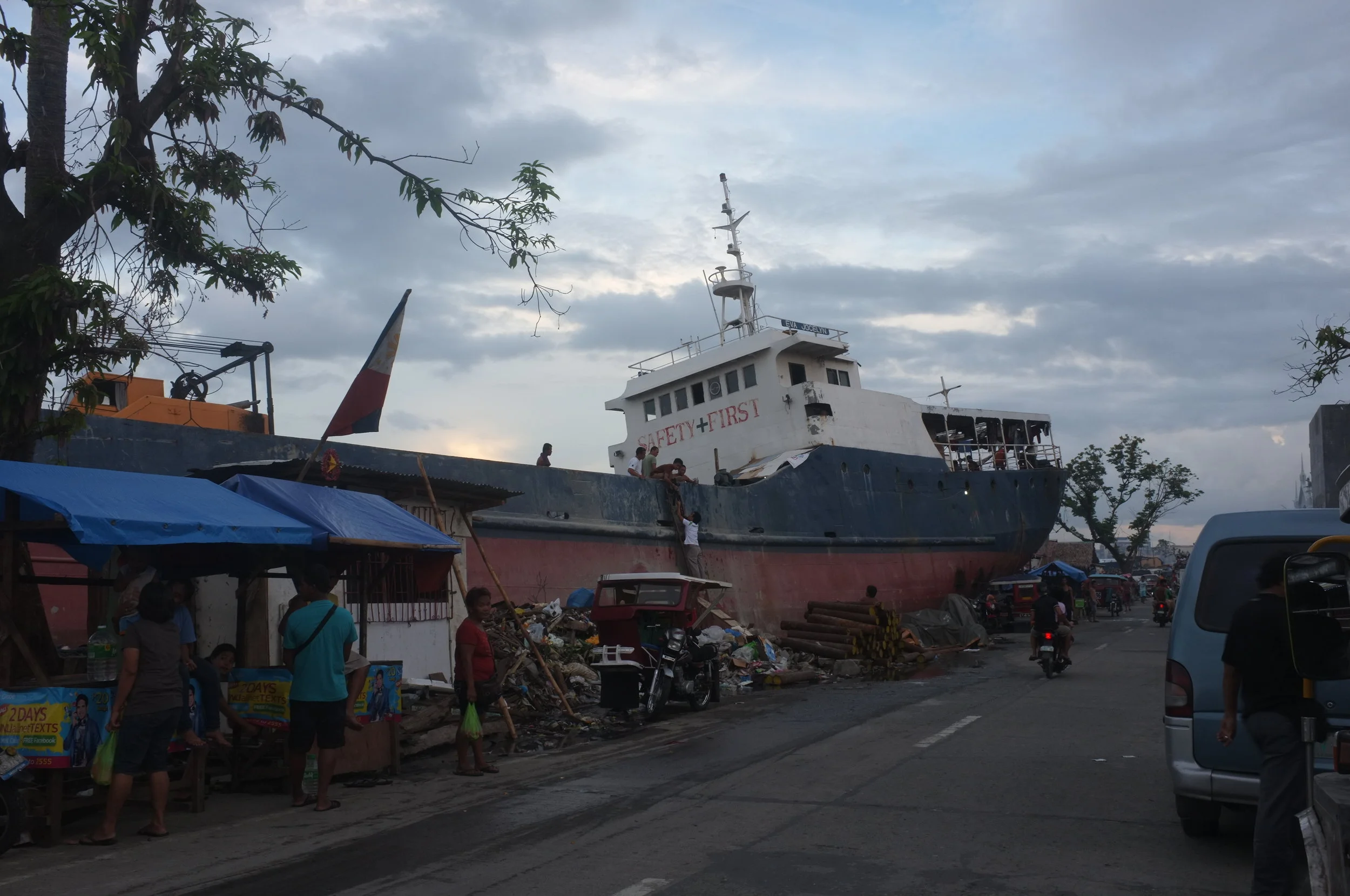  December 2013 | Tacloban, Philippines: One of many merchant ships that washed up on the shores in Tacloban. 
