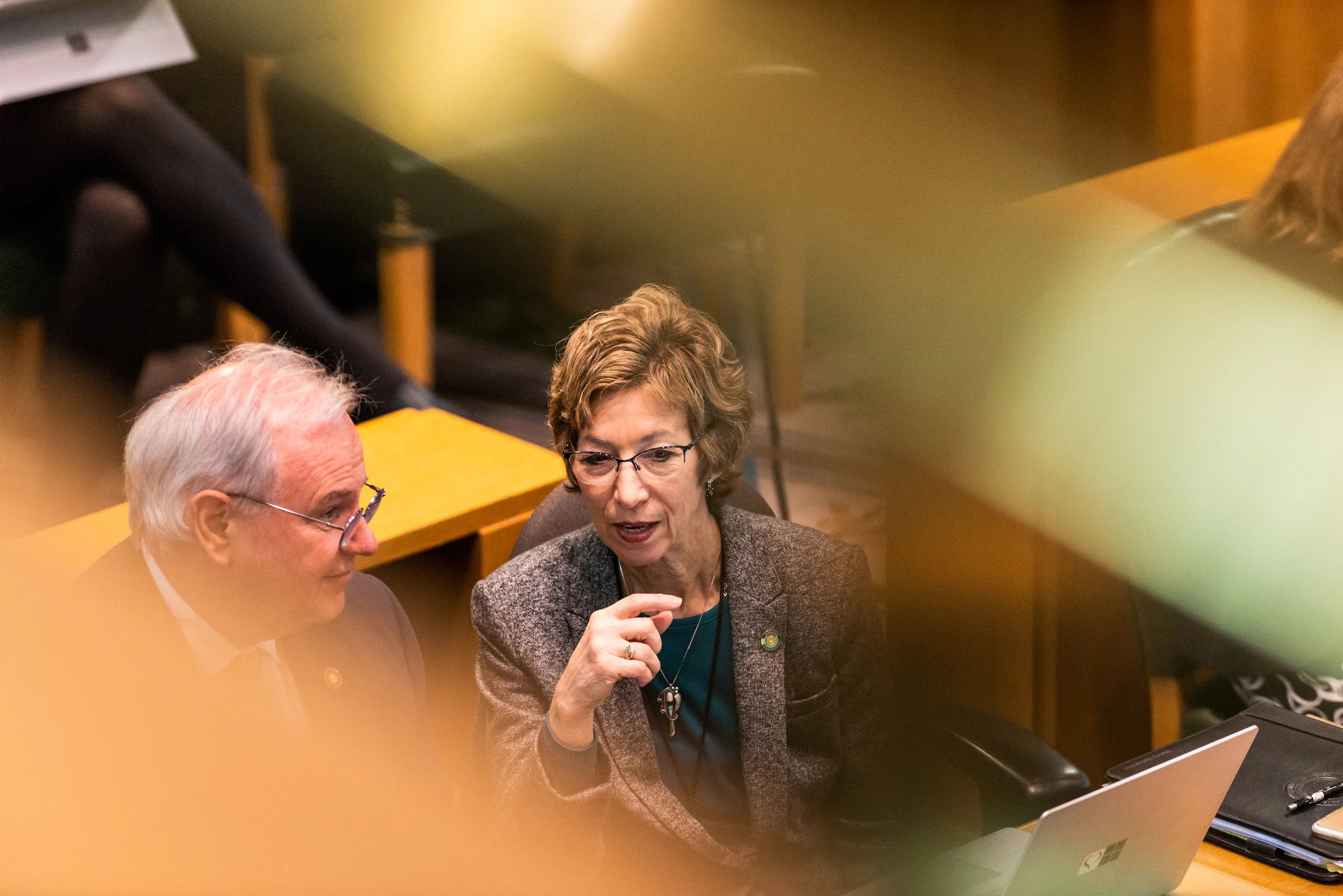 April 2019 | Salem , OR: Representative Keyshawn Whitehourse and Ezekiel Mitchell talk during a legislative session at the Oregon Capitol in Salem.