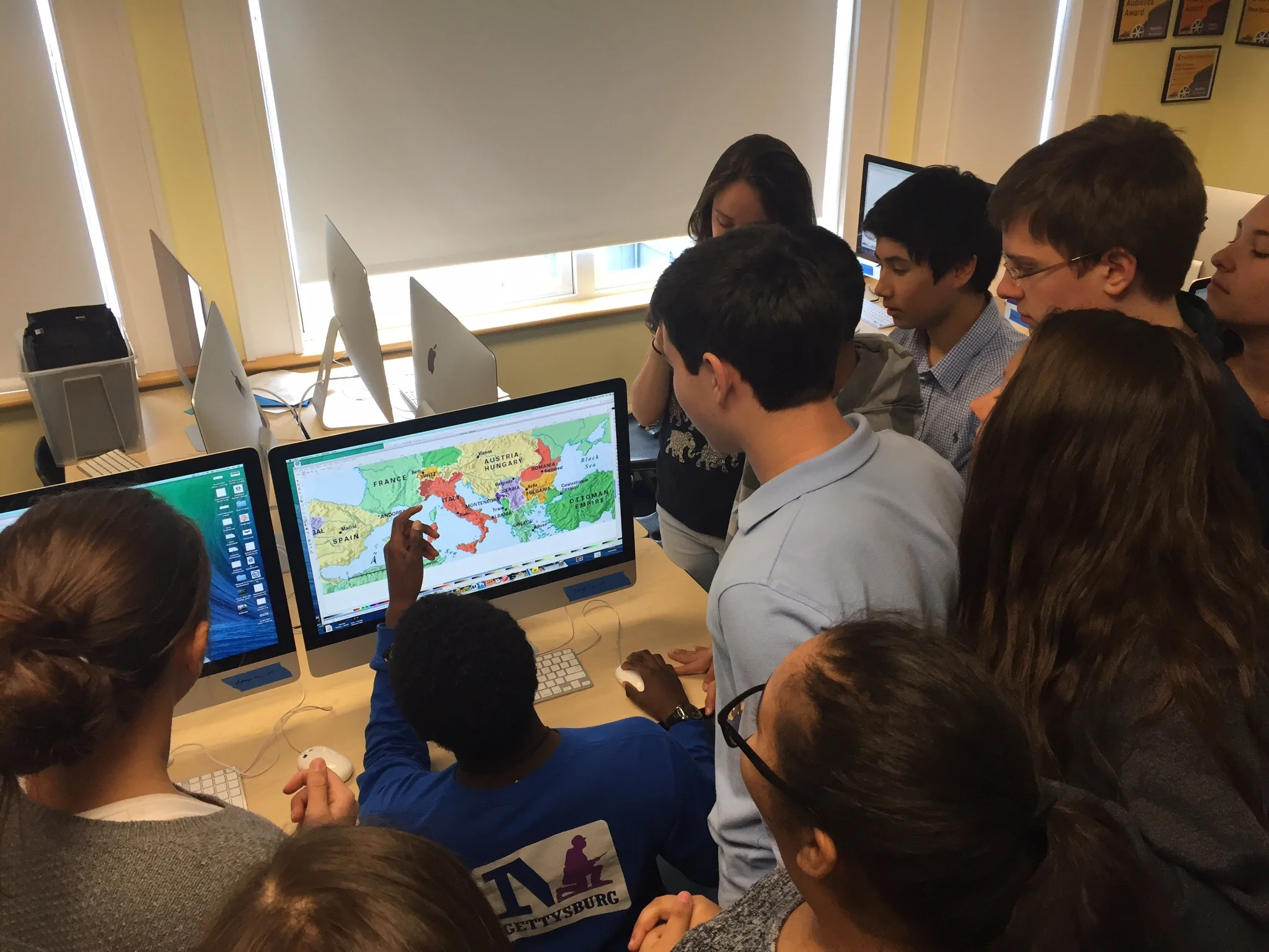 Students teaching students as they design laser cut world war 1 maps in social studies.  