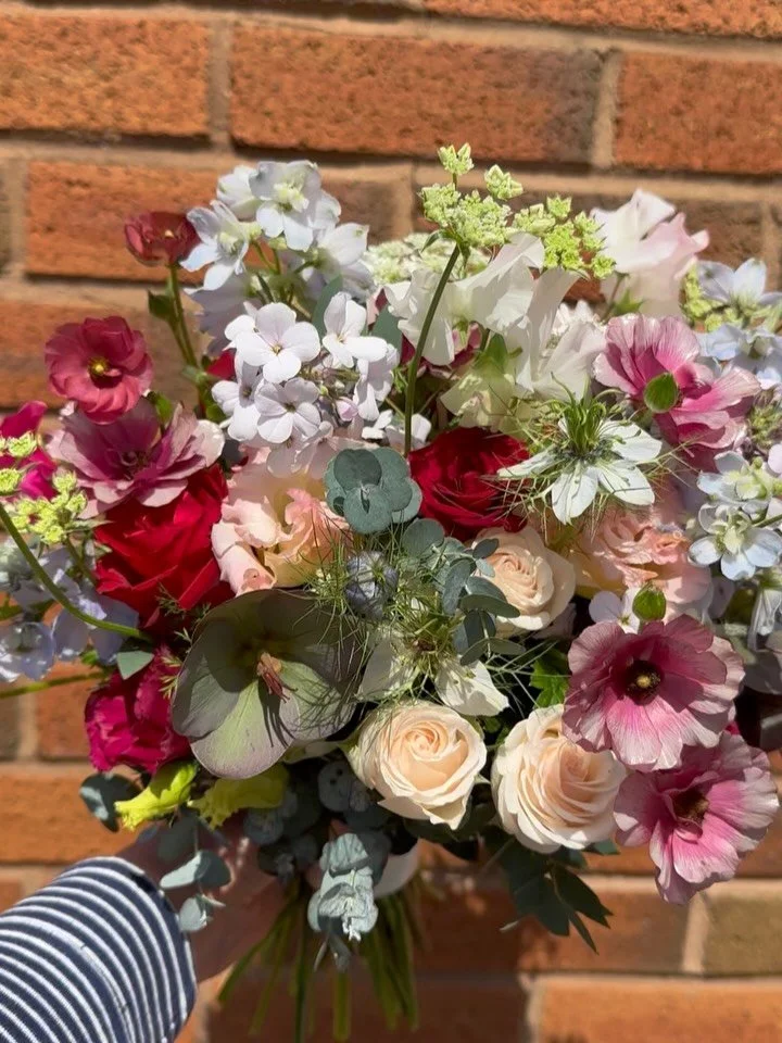 Helen&rsquo;s beautifully delicate wedding bouquet including butterfly ranunculus, plus the first of our homegrown sweetpeas and nigella and so much more. Loved creating a slightly different colour palette for the lovely Helen 💕
