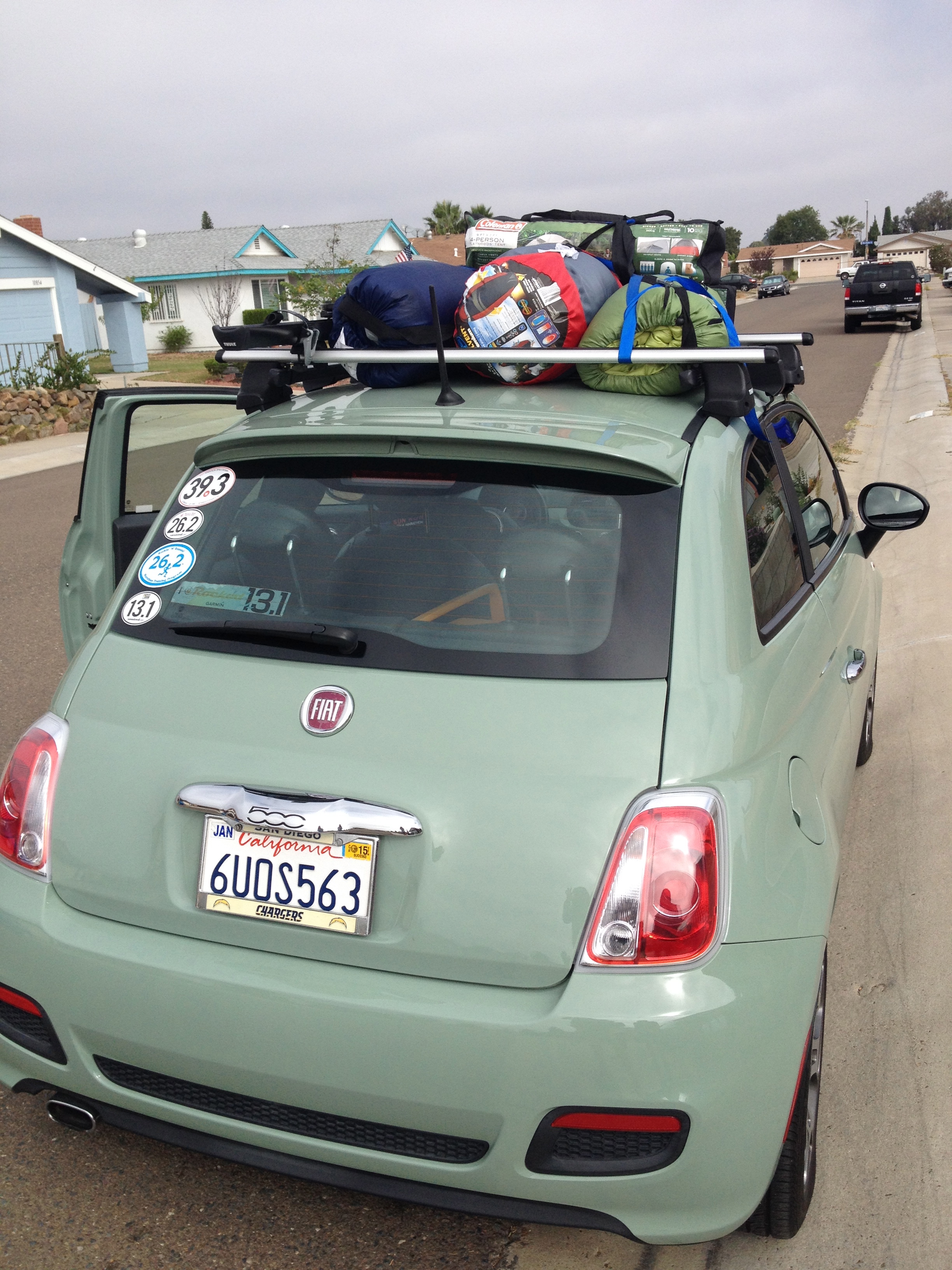 the lil FIAT that could. 4 women. 2 tents. 6 gallons of water. 4 bags, 4 sleeping bags. 1 cooler. this is not a joke.