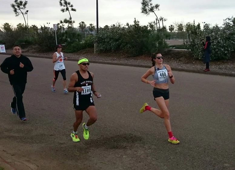 my amazing friend suly won the 10k and then came back a half mile to run me in. I kept hearing "relax, loosen up."