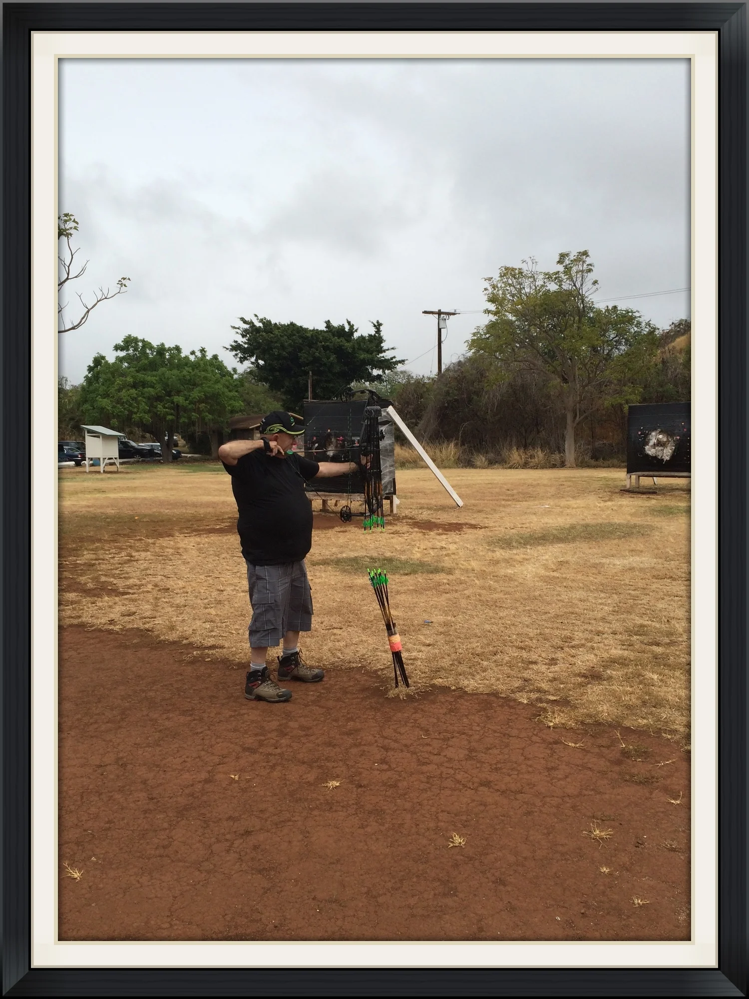 Dad sighting in his bow @ Bushwackers Archery Range before our pig hunt.