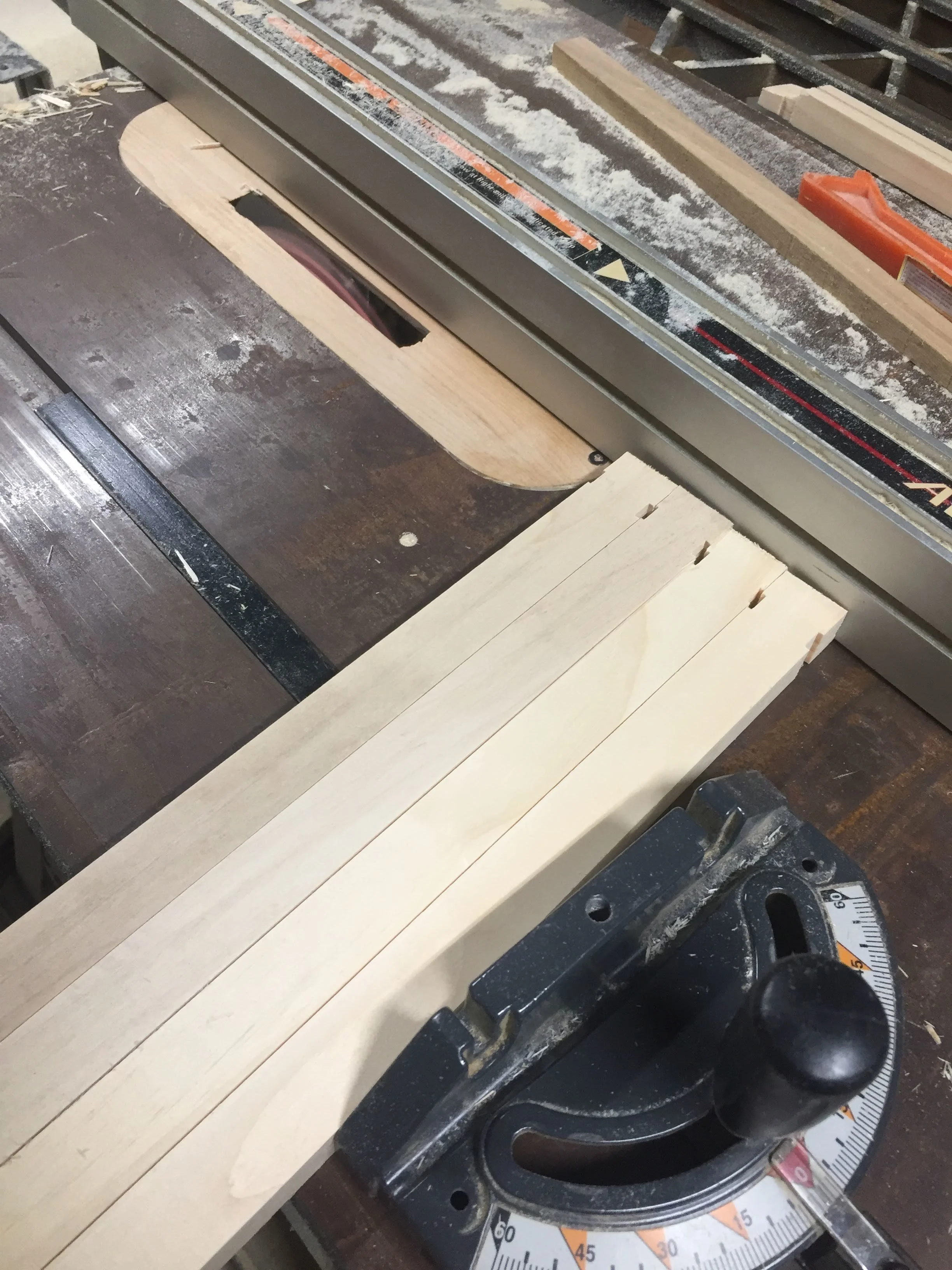 Cutting the deeper groove on the bottom of the top bar.